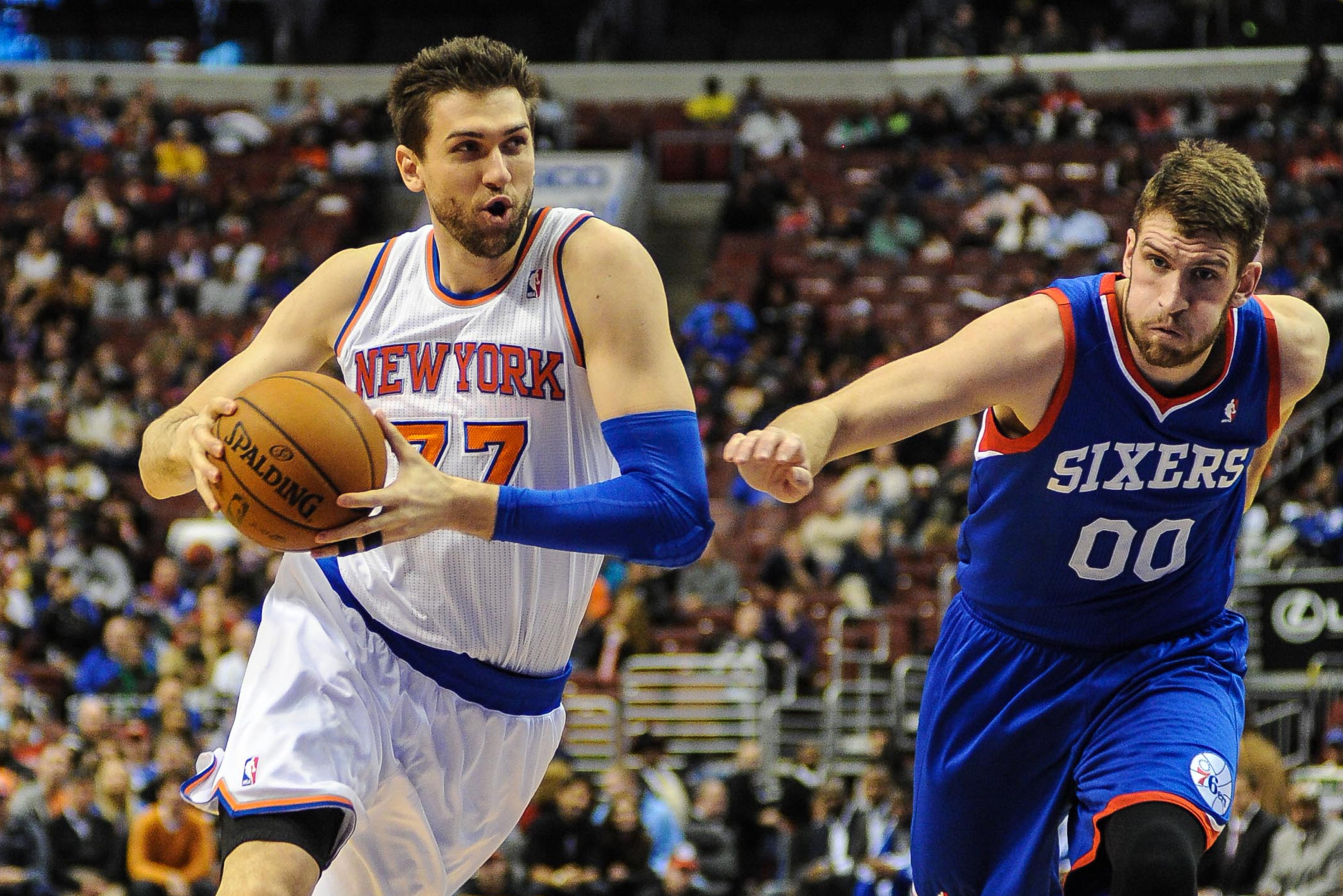 Jan 11, 2014; Philadelphia, PA, USA; New York Knicks power forward Andrea Bargnani (77) drives toward the net during the game against the Philadelphia 76ers at the Wells Fargo Center. Mandatory Credit: John Geliebter-USA TODAY Sports