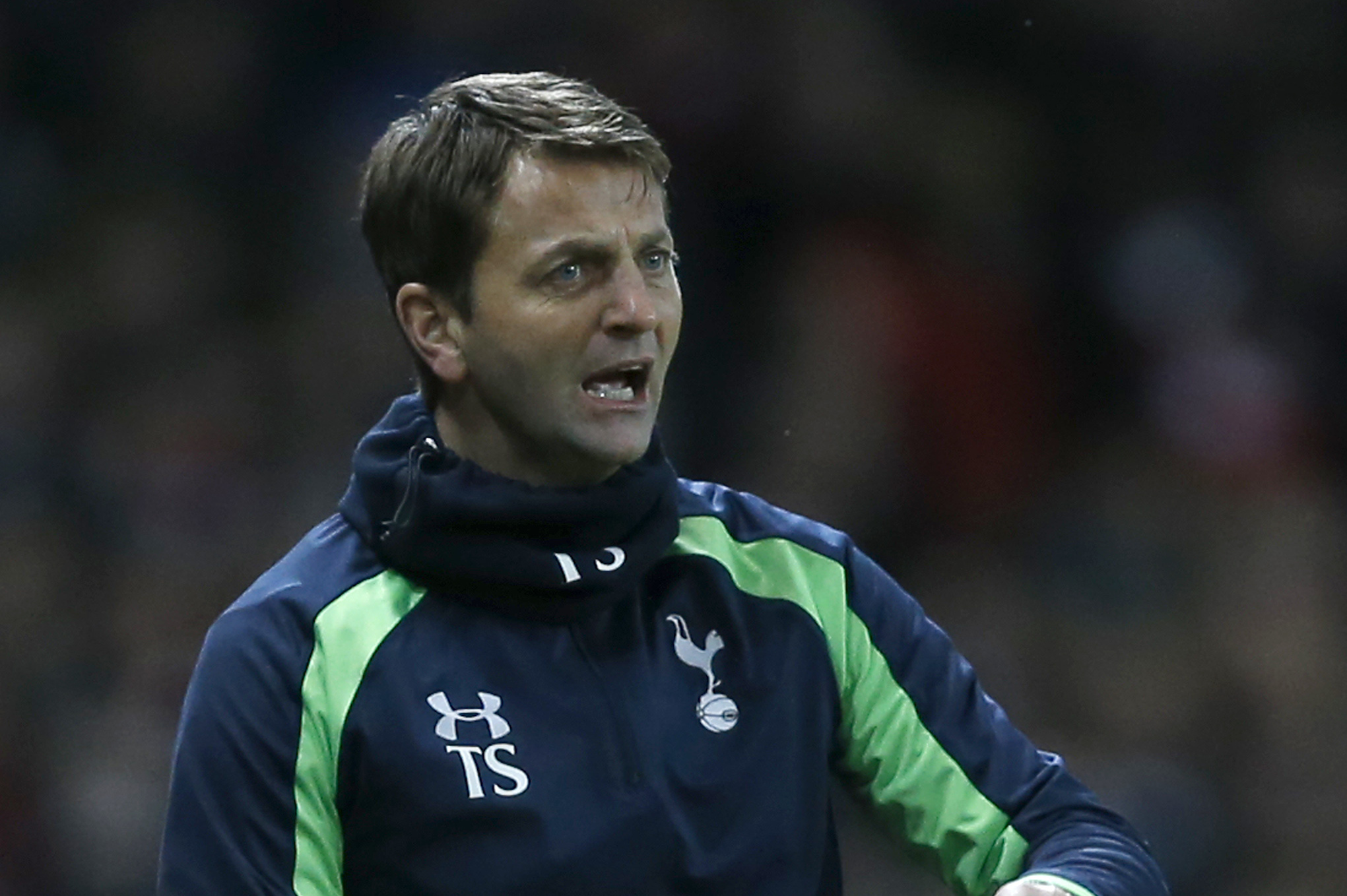 Tottenham's manager Tim Sherwood gestures from the touch line as he watches his team during the English FA Cup third round soccer match between Arsenal and Tottenham Hotspur at the Emirates Stadium in London, Saturday, Jan. 4, 2014. (AP Photo/Kirsty Wigglesworth)