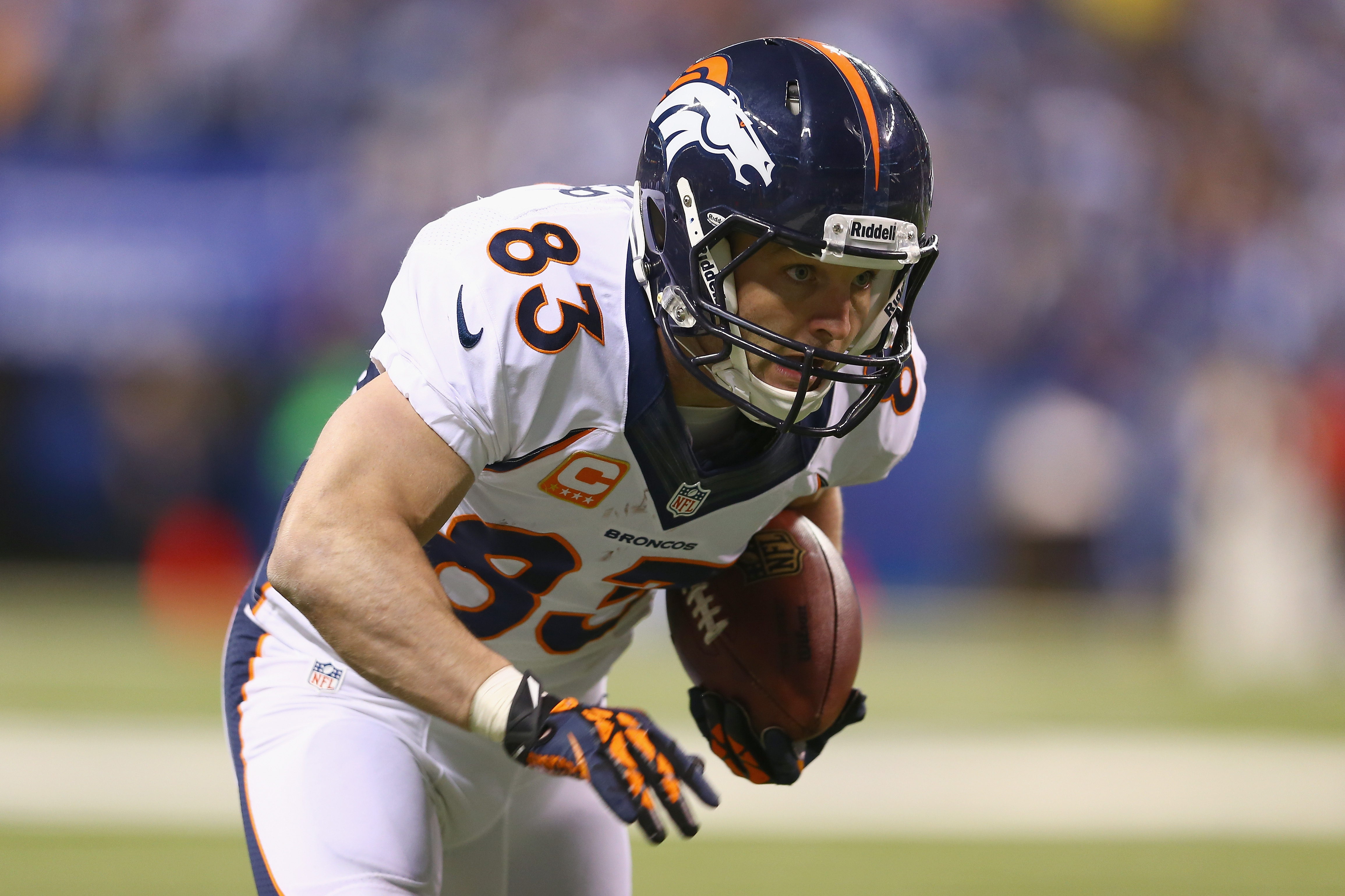 INDIANAPOLIS, IN - OCTOBER 20:  Wes Welker #83 of the Denver Broncos runs with the ball during the game against the Indianapolis Colts at Lucas Oil Stadium on October 20, 2013 in Indianapolis, Indiana.  (Photo by Andy Lyons/Getty Images)
