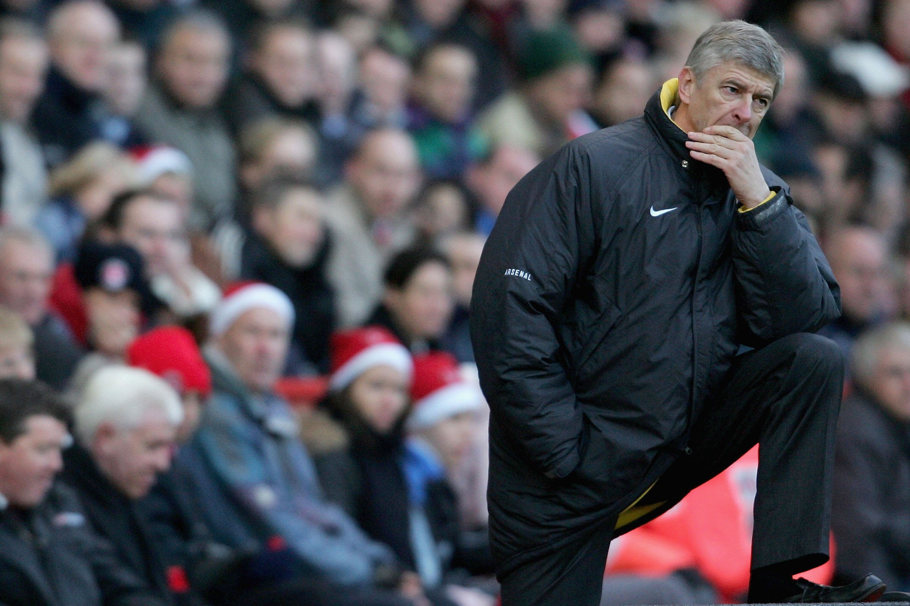 LONDON - DECEMBER 26:  Arsenal manager Arsene Wegner looks on during the Barclays Premiership match between Charlton and Arsenal at The Valley on December 26, 2005 in London, England.  (Photo by Jamie McDonald/Getty Images)