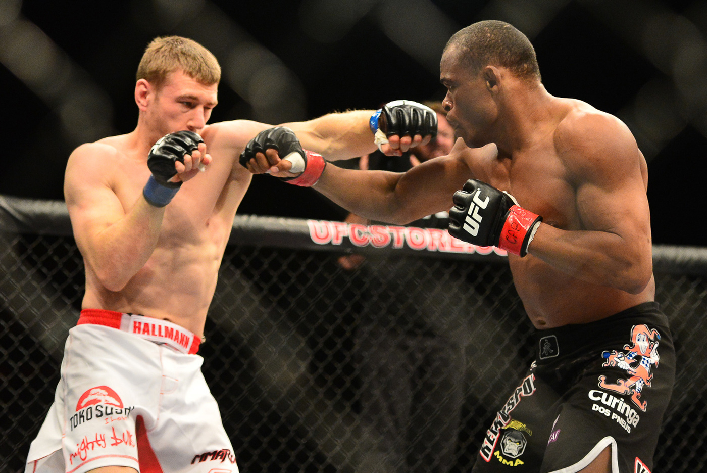 Sep 4, 2013; Belo Horizonte, BRAZIL;  Francisco Massaranduba Trinaldo fights against Piotr Hallmann (white shorts) during UFC Fight Night at Mineirinho Arena. Mandatory Credit: Jason Silva-USA TODAY Sports