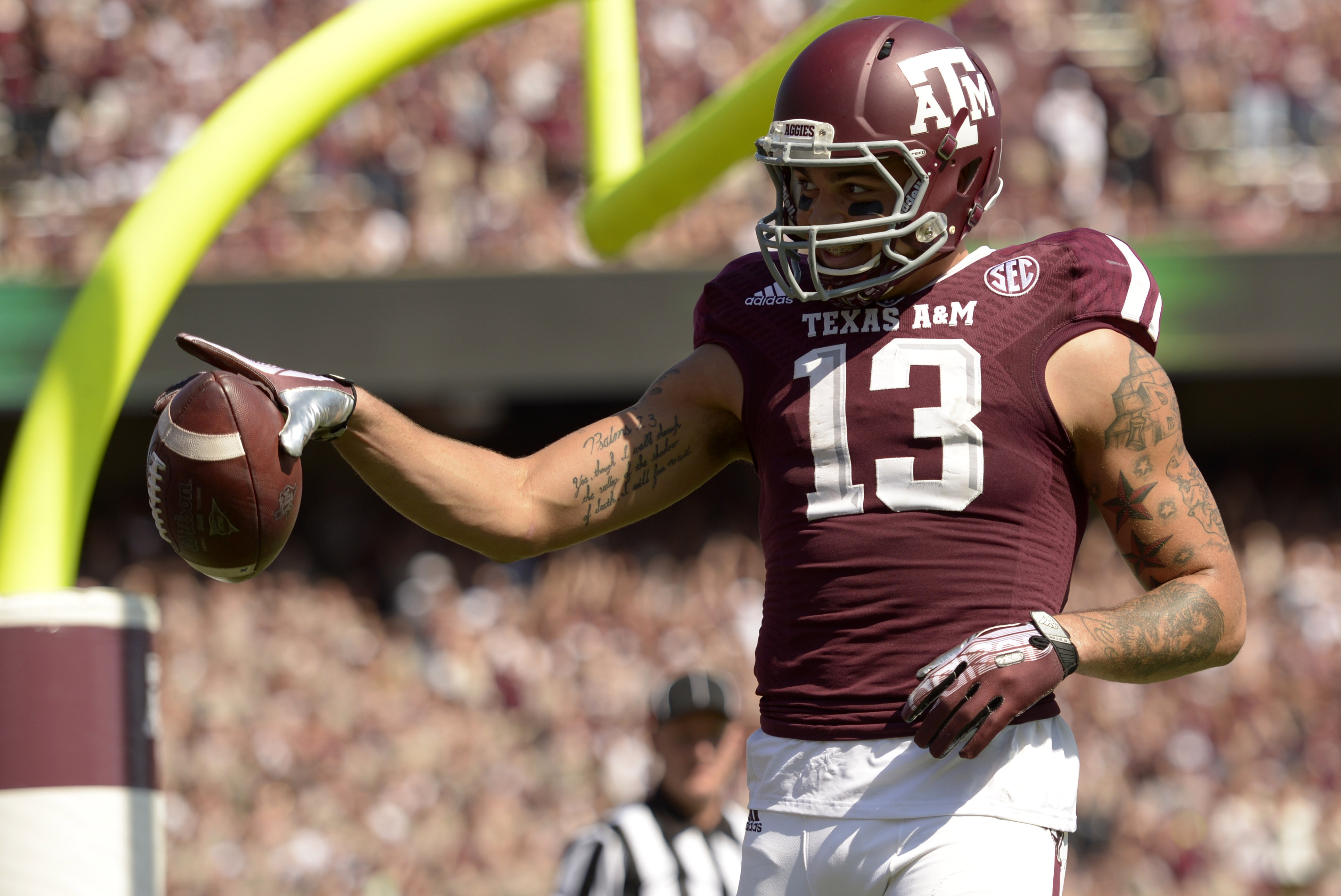 Oct 26, 2013; College Station, TX, USA; Texas A&M Aggies wide receiver Mike Evans (13) celebrates scoring a touchdown against the Vanderbilt Commodores during the second half at Kyle Field. Texas A&M won 56-24. Mandatory Credit: Thomas Campbell-USA TODAY Sports