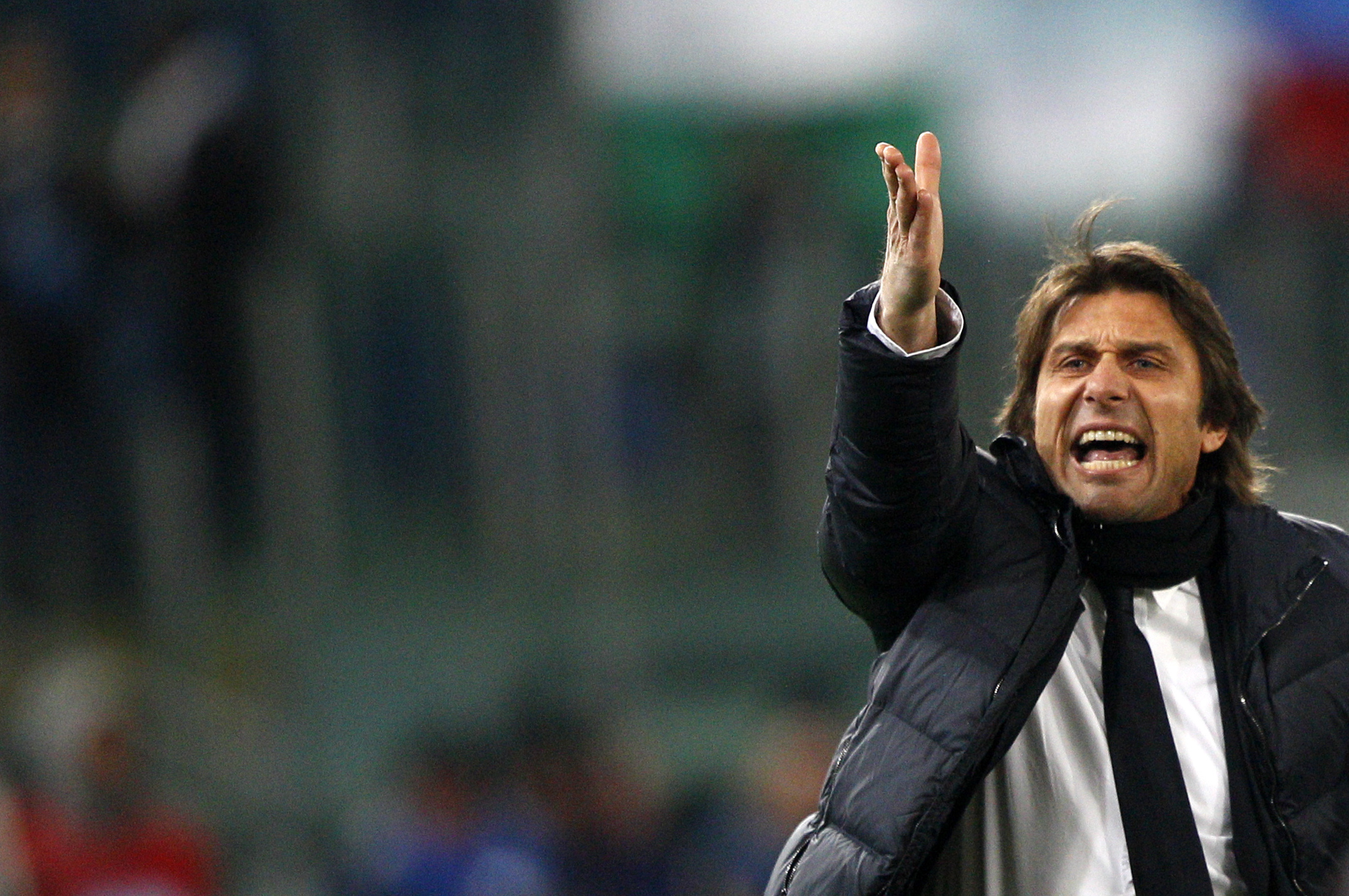 Juventus coach Antonio Conte shouts during a Serie A soccer match between Lazio and Juventus, at Rome's Olympic stadium, Saturday, Jan. 25, 2014. (AP Photo/Riccardo De Luca)