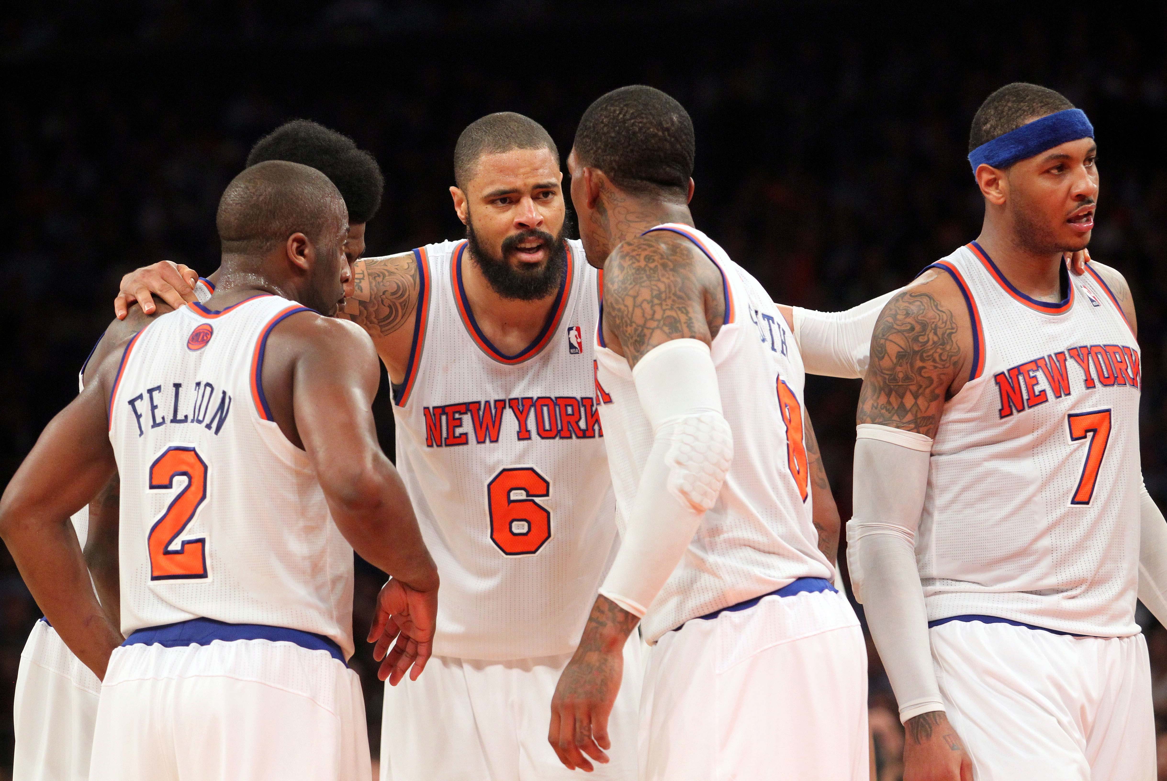 May 1, 2013; New York, NY, USA; New York Knicks guard Raymond Felton (2) and forward Iman Shumpert (21) and center Tyson Chandler (6) and guard J.R. Smith (8) and forward Carmelo Anthony (7) huddle after a timeout during the fourth quarter of game five of the first round of the 2013 NBA Playoffs against the Boston Celtics at Madison Square Garden. Mandatory Credit: Brad Penner-USA TODAY Sports