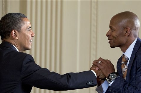President Barack Obama shakes hand with Miami Heat guard Ray Allen as he welcomes the NBA basketball champion Miami Heat to the East Room of the White House, Monday, Jan. 28, 2013, in Washington. (AP Photo/Carolyn Kaster)
