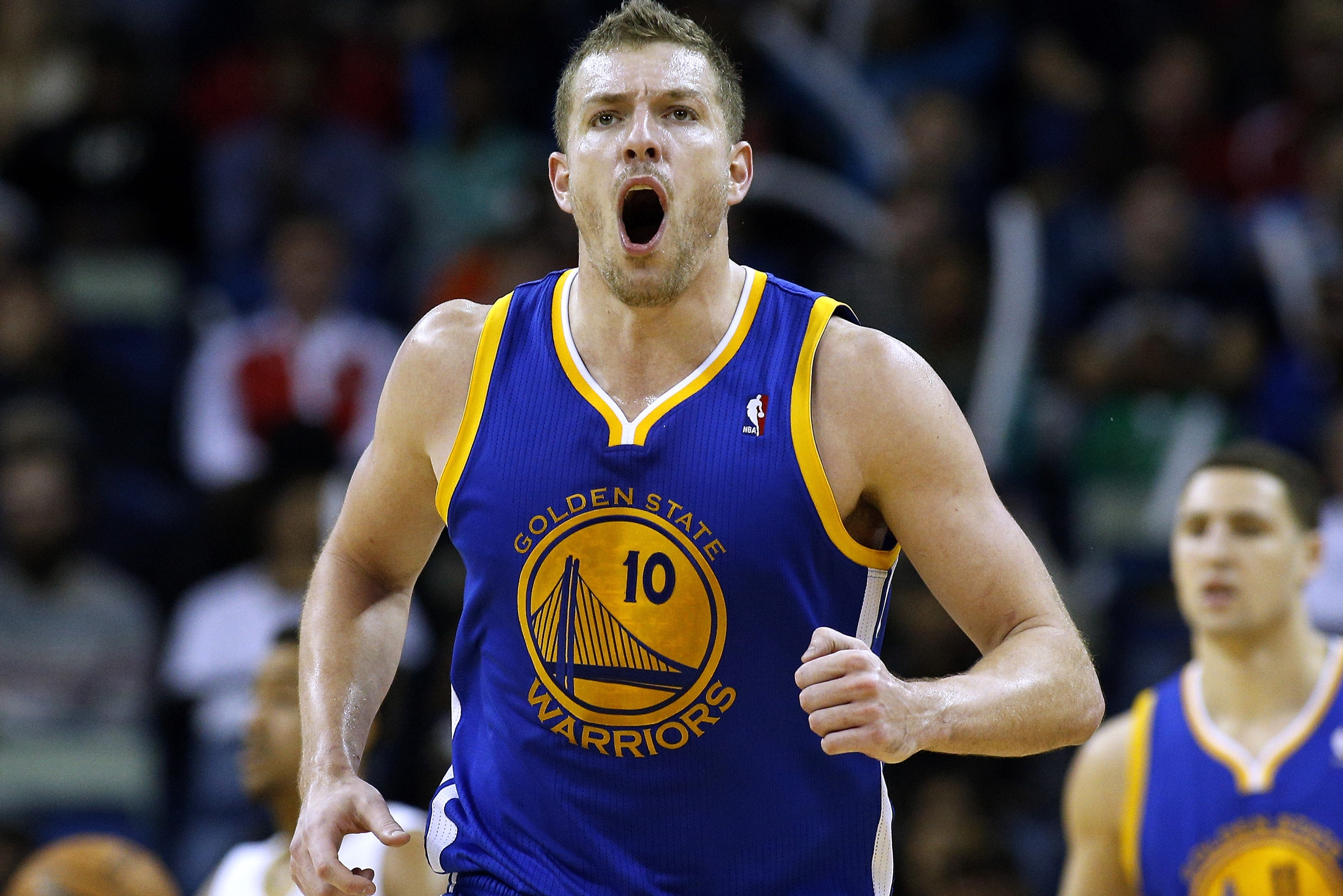 Golden State Warriors power forward David Lee (10) reacts after scoring during the second half of an NBA basketball game against the New Orleans Pelicans in New Orleans, Saturday, Jan. 18, 2014. The Warriors won 97-87. (AP Photo/Jonathan Bachman)