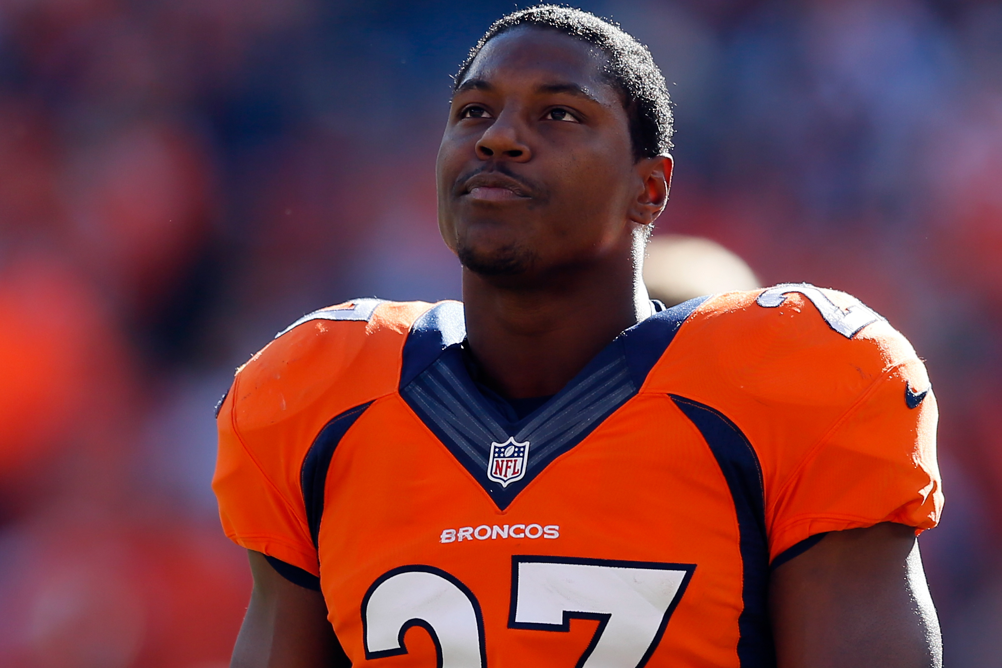DENVER, CO - JANUARY 19:  Knowshon Moreno #27 of the Denver Broncos looks on against the New England Patriots during the AFC Championship game at Sports Authority Field at Mile High on January 19, 2014 in Denver, Colorado.  (Photo by Kevin C. Cox/Getty Images)