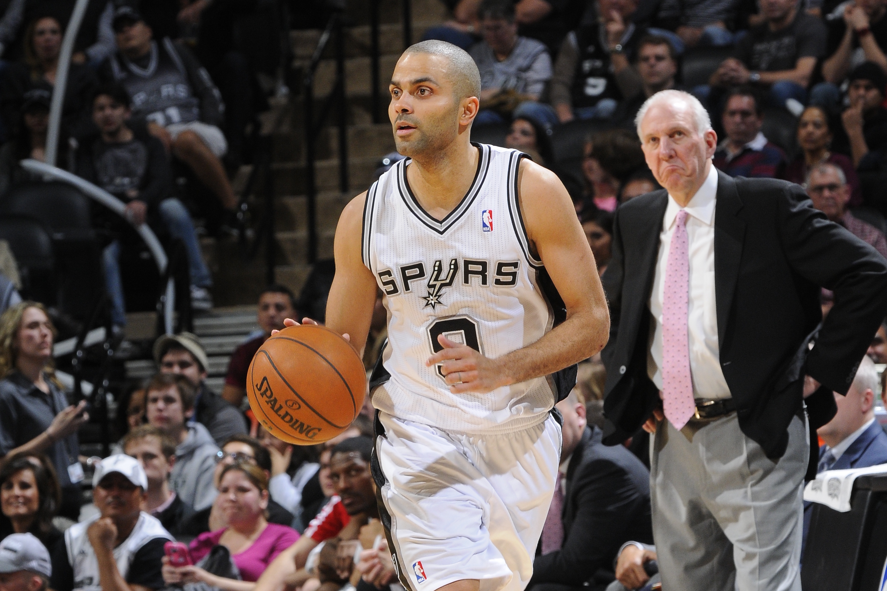 SAN ANTONIO, TX - January 29: Tony Parker #9 of the San Antonio Spurs dribbles up the court against the Chicago Bulls during the game at the AT&T Center on January 29, 2014 in San Antonio, Texas. NOTE TO USER: User expressly acknowledges and agrees that, by downloading and or using this photograph, user is consenting to the terms and conditions of the Getty Images License Agreement. Mandatory Copyright Notice: Copyright 2014 NBAE (Photos by D. Clarke Evans/NBAE via Getty Images)