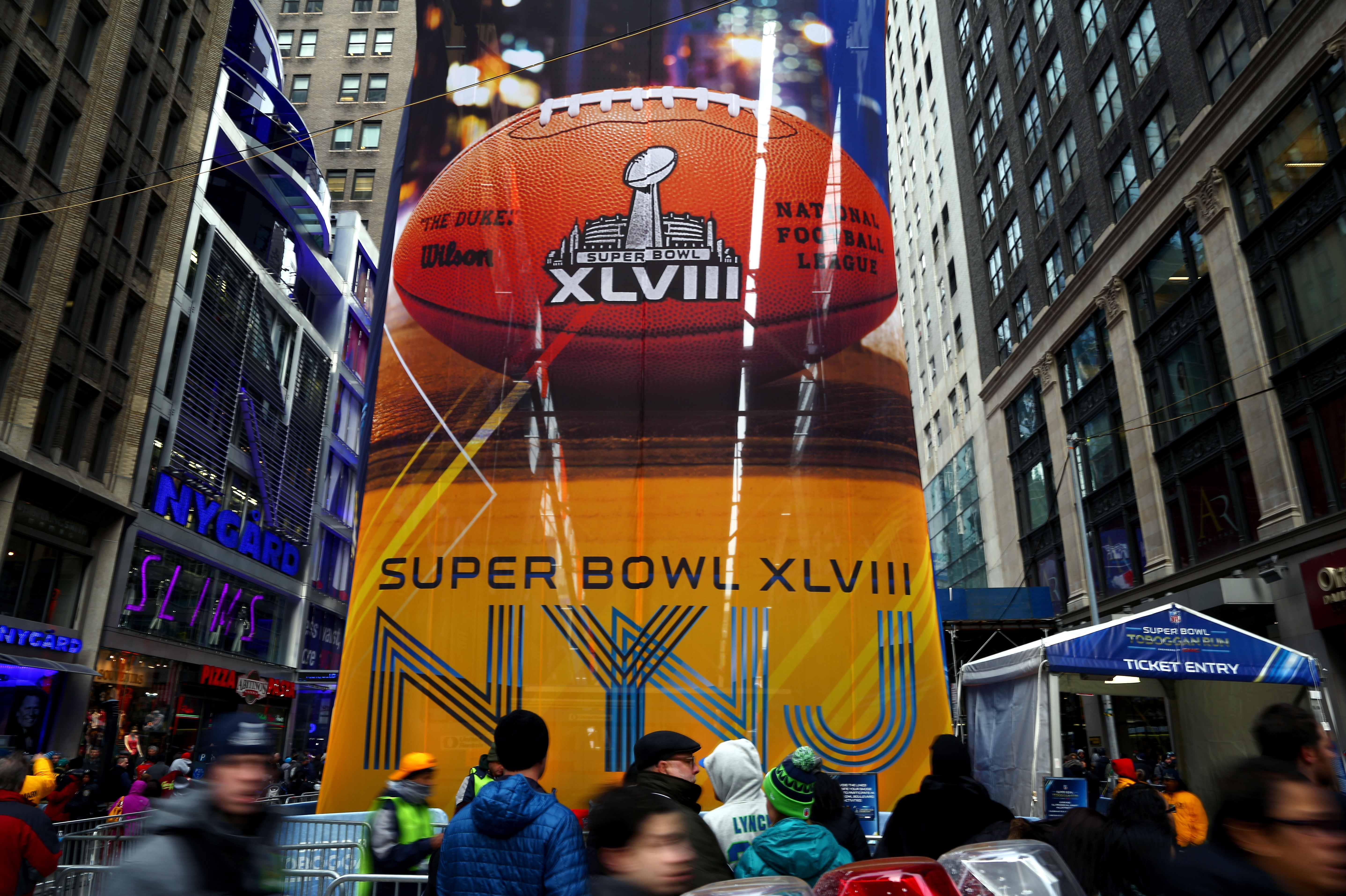 NEW YORK, NY - JANUARY 31:  Fans participate in the festivities on Super Bowl Boulevard in Times Square prior to Super Bowl XLVIII on January 31, 2014 in New York City. Super Bowl XLVIII will be played between the Seattle Seahawks and the Denver Broncos on February 2, 2014 at MetLife Stadium in East Rutherford, New Jersey.  (Photo by Tom Pennington/Getty Images)
