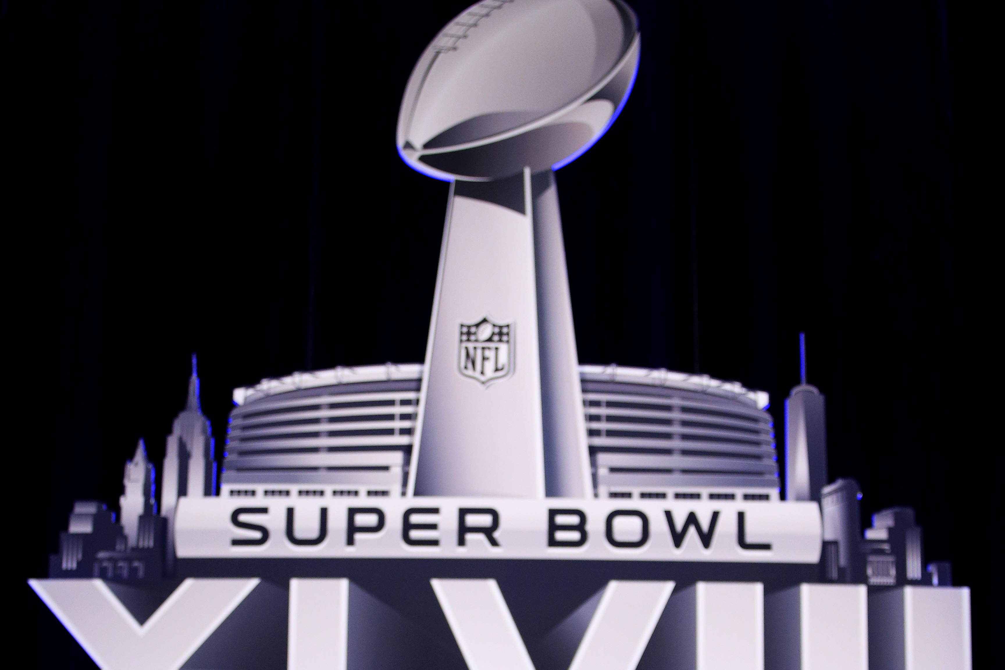 NEW YORK, NY - JANUARY 31:  The Vince Lombardi Trophy and helmets for the Denver Broncos and the Seattle Seahawks are displayed prior to a Super Bowl XLVIII head coach joint press conference at the Rose Theater in Jazz at Lincoln Center on January 31, 2014 in New York City.  (Photo by Jamie Squire/Getty Images)