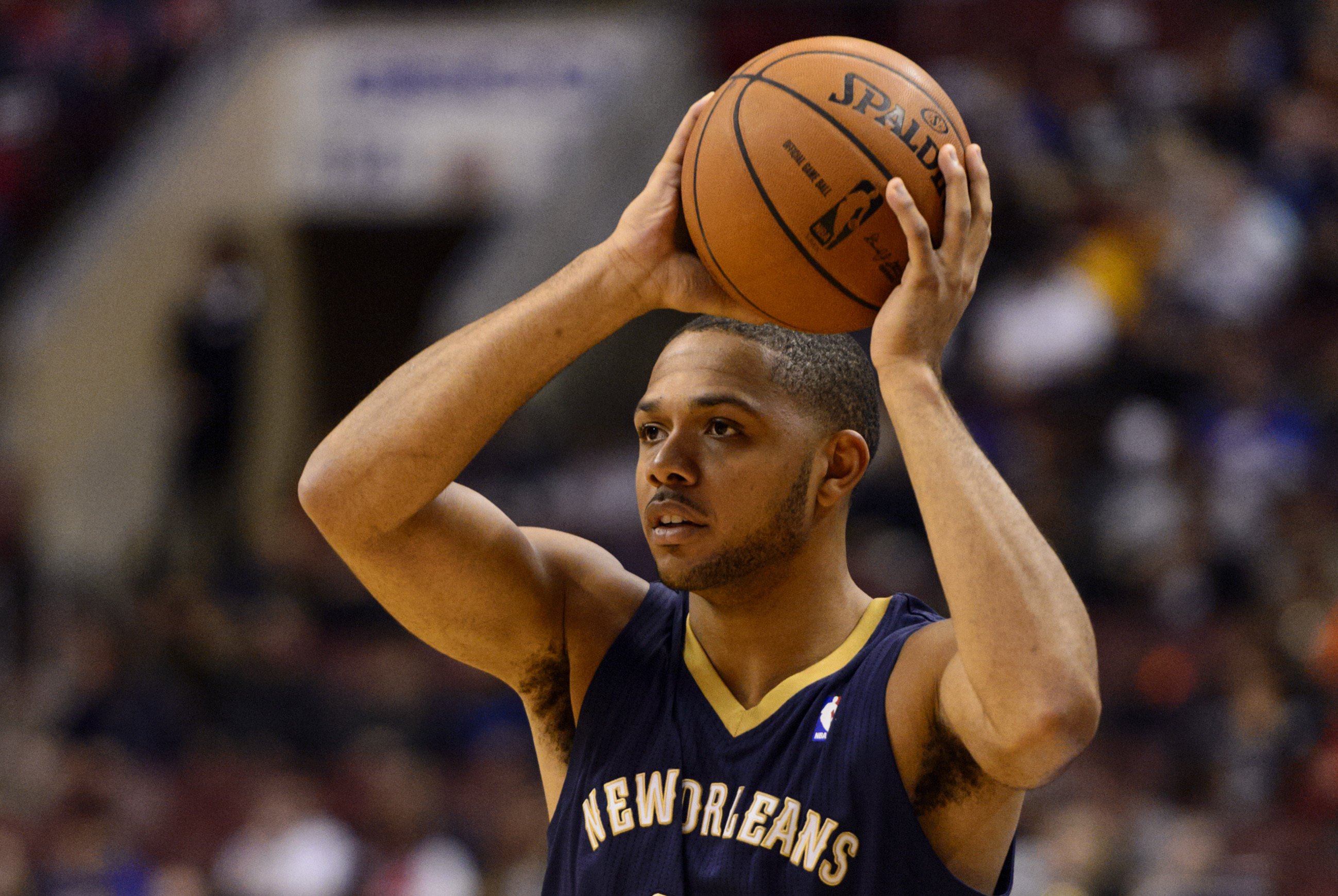 Nov 29, 2013; Philadelphia, PA, USA; New Orleans Pelicans guard Eric Gordon (10) looks to pass during the first quarter against the Philadelphia 76ers at the Wells Fargo Center. The Pelicans defeated the Sixers 121-105. Mandatory Credit: Howard Smith-USA TODAY Sports