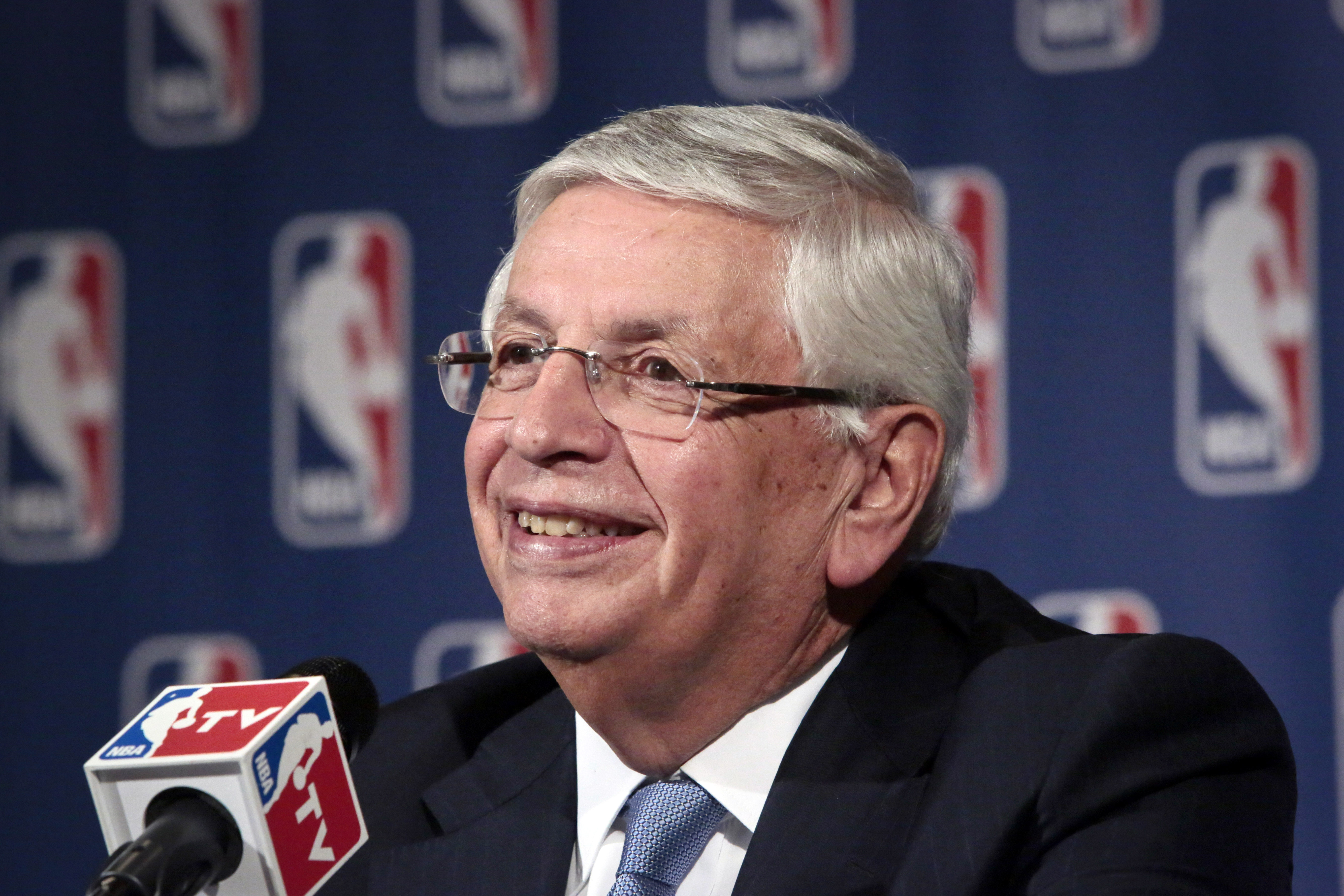 FILE - In this undated, file photo, NBA Commissioner David Stern smiles during a news conference after an NBA board of governors meeting Wednesday, Oct. 23, 2013, in New York. The game is about the players, and nobody understood that better than the commissioner, who is retiring Saturday Feb. 1, 2014 after exactly 30 years on the job. He would likely say that the league is where it is because of Bird and Magic, Kobe and Shaq, Michael Jordan and now LeBron James.  (AP Photo/Bebeto Matthews)