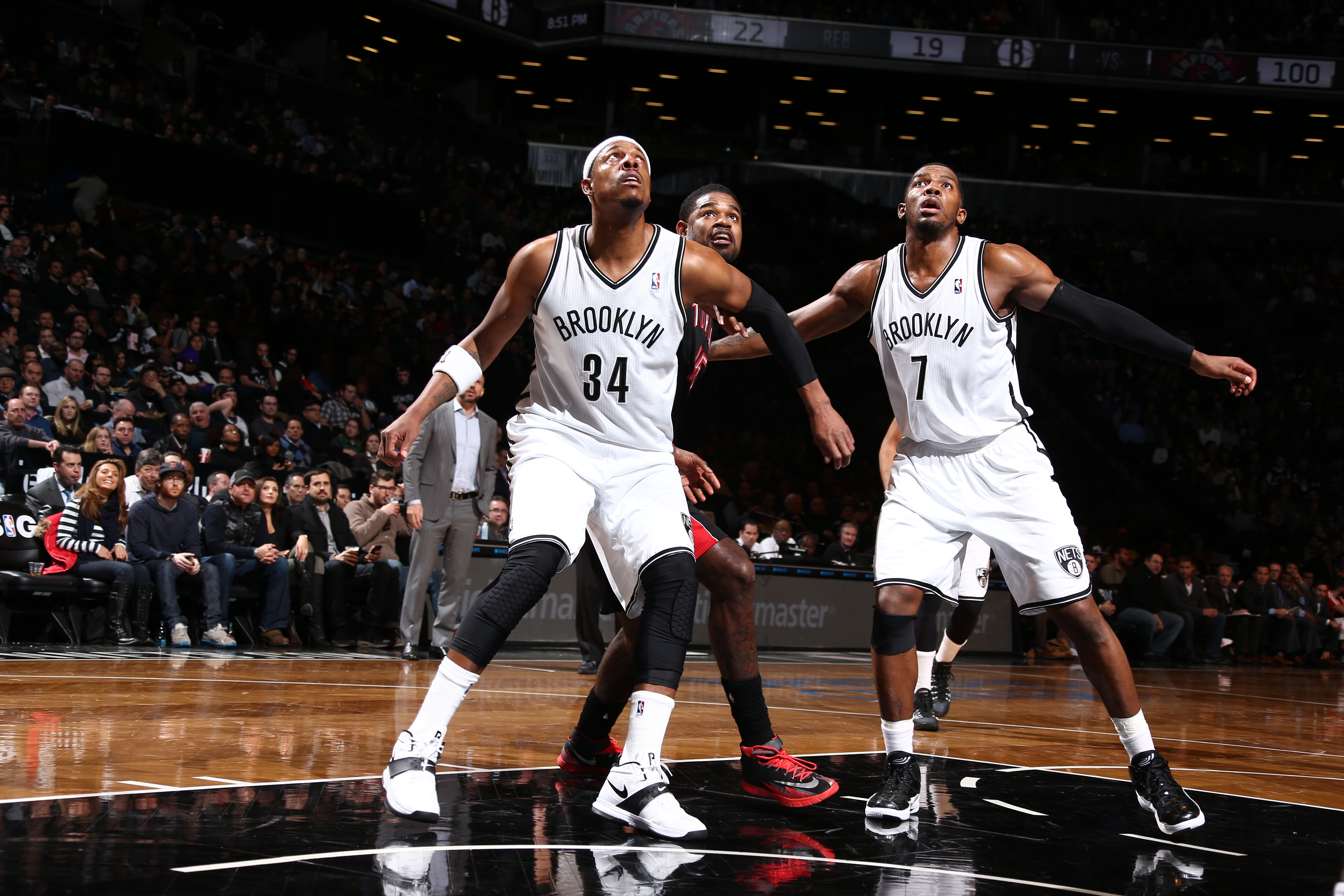 BROOKLYN, NY - JANUARY 27: Paul Pierce #34 of the Brooklyn Nets and Joe Johnson #7 of the Brooklyn Nets box out after a free throw against the Toronto Raptors during a game at Barclays Center in Brooklyn. NOTE TO USER: User expressly acknowledges and agrees that, by downloading and or using this photograph, User is consenting to the terms and conditions of the Getty Images License Agreement. Mandatory Copyright Notice: Copyright 2014 NBAE (Photo by Nathaniel S. Butler/NBAE via Getty Images)