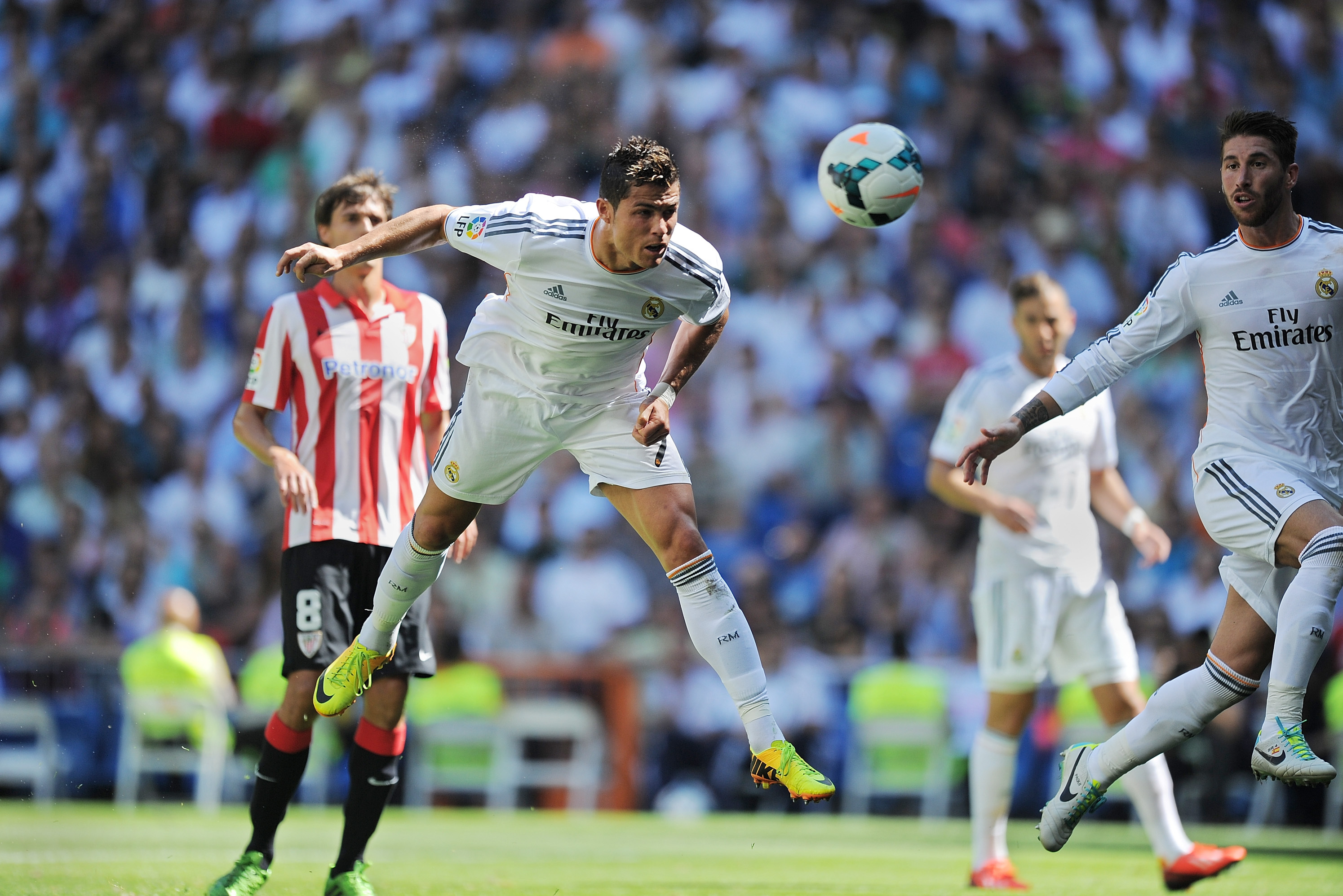 MADRID, SPAIN - SEPTEMBER 01:  Cristiano Ronaldo of Real Madrid scores Real's 2nd goal during the La Liga match between Real Madrid CF and Athletic Club Bilbao at estadio Santiago Bernabeu on September 1, 2013 in Madrid, Spain.  (Photo by Denis Doyle/Getty Images)