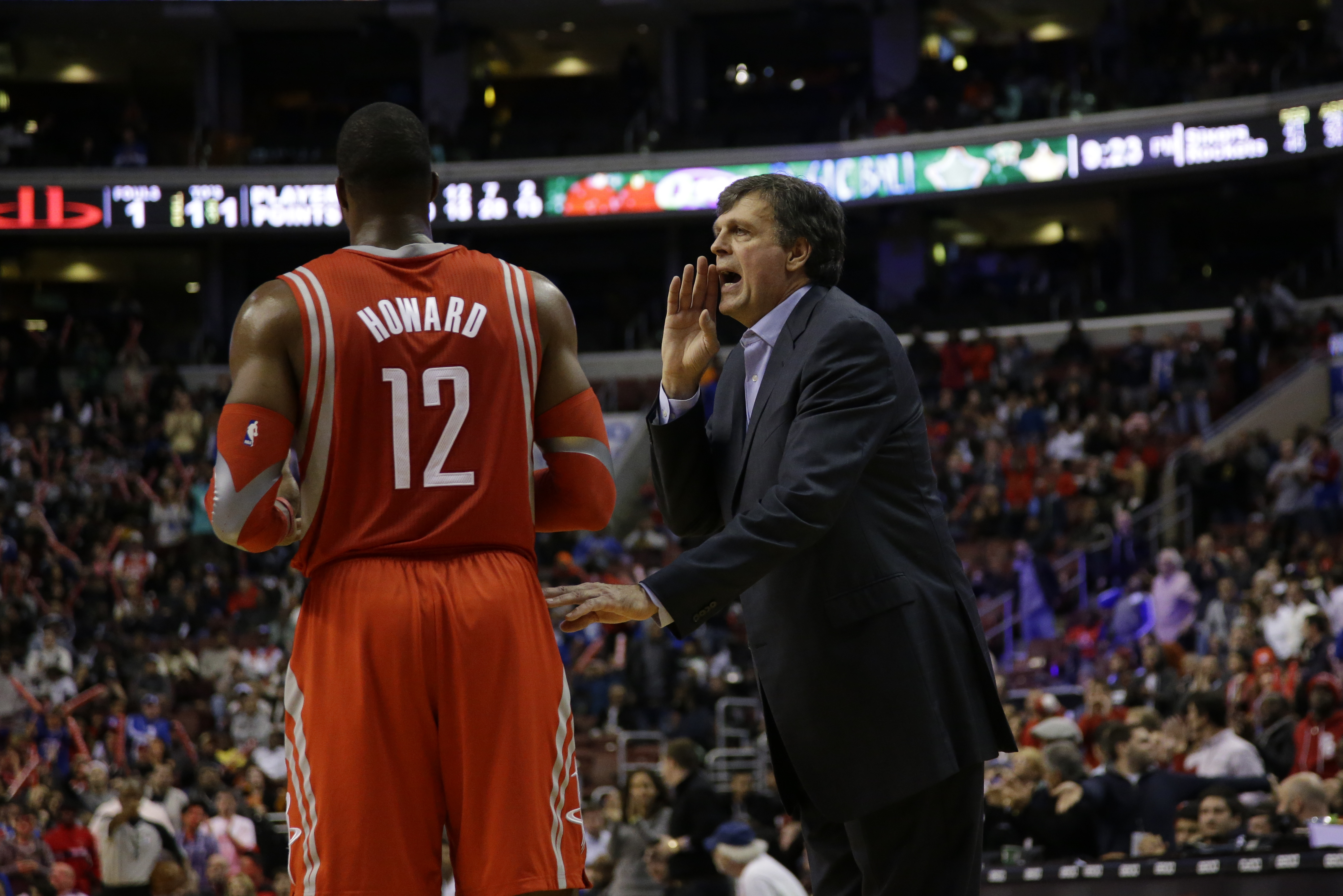 Houston Rockets' Kevin McHale, right, talks with Dwight Howard during an NBA basketball game against the Philadelphia 76ers, Wednesday, Nov. 13, 2013, in Philadelphia. (AP Photo/Matt Slocum)