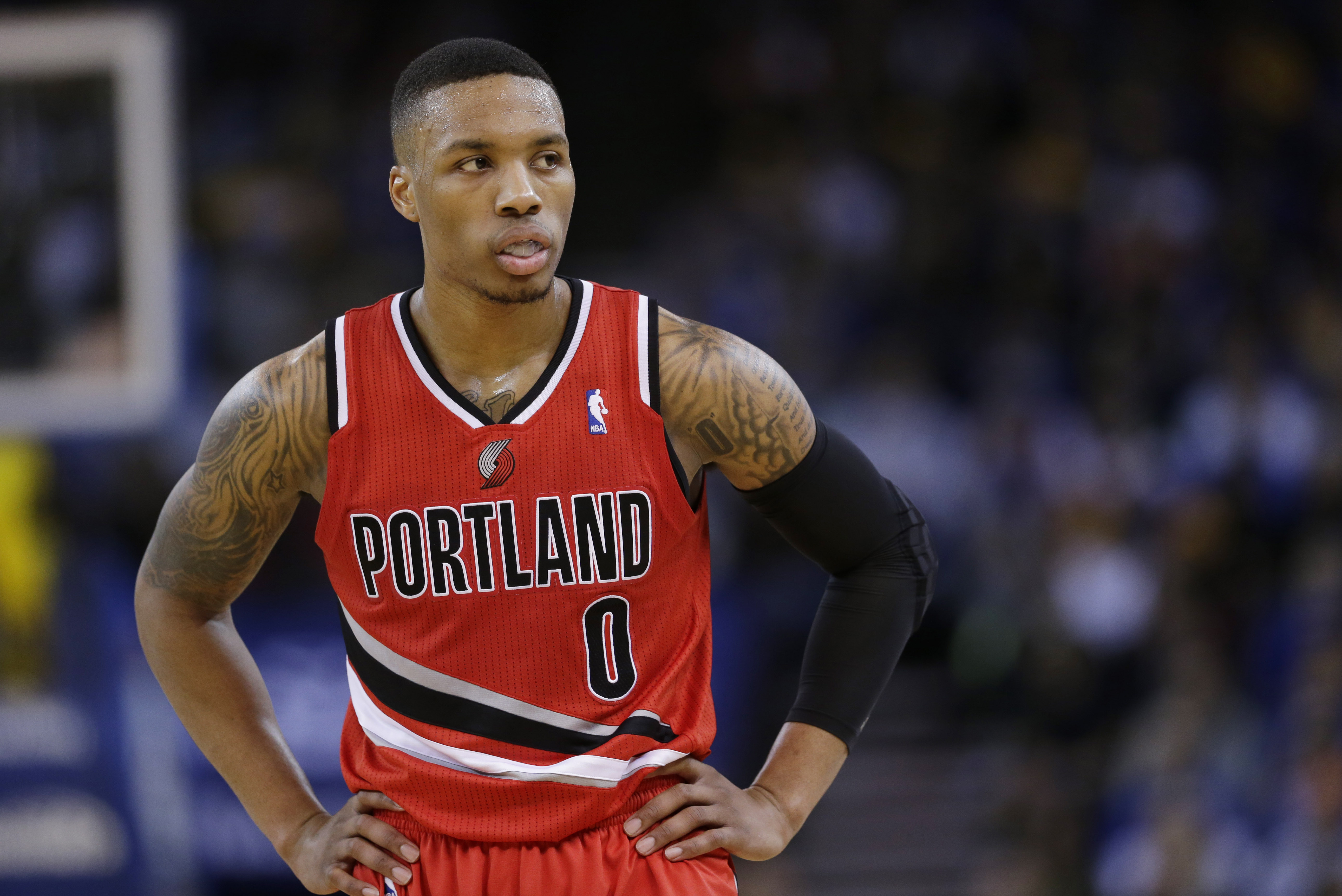 Portland Trail Blazers' Damian Lillard in action against the Golden State Warriors during an NBA basketball game on Sunday, Jan. 26, 2014, in Oakland, Calif. Golden State won 103-88. (AP Photo/Marcio Jose Sanchez)
