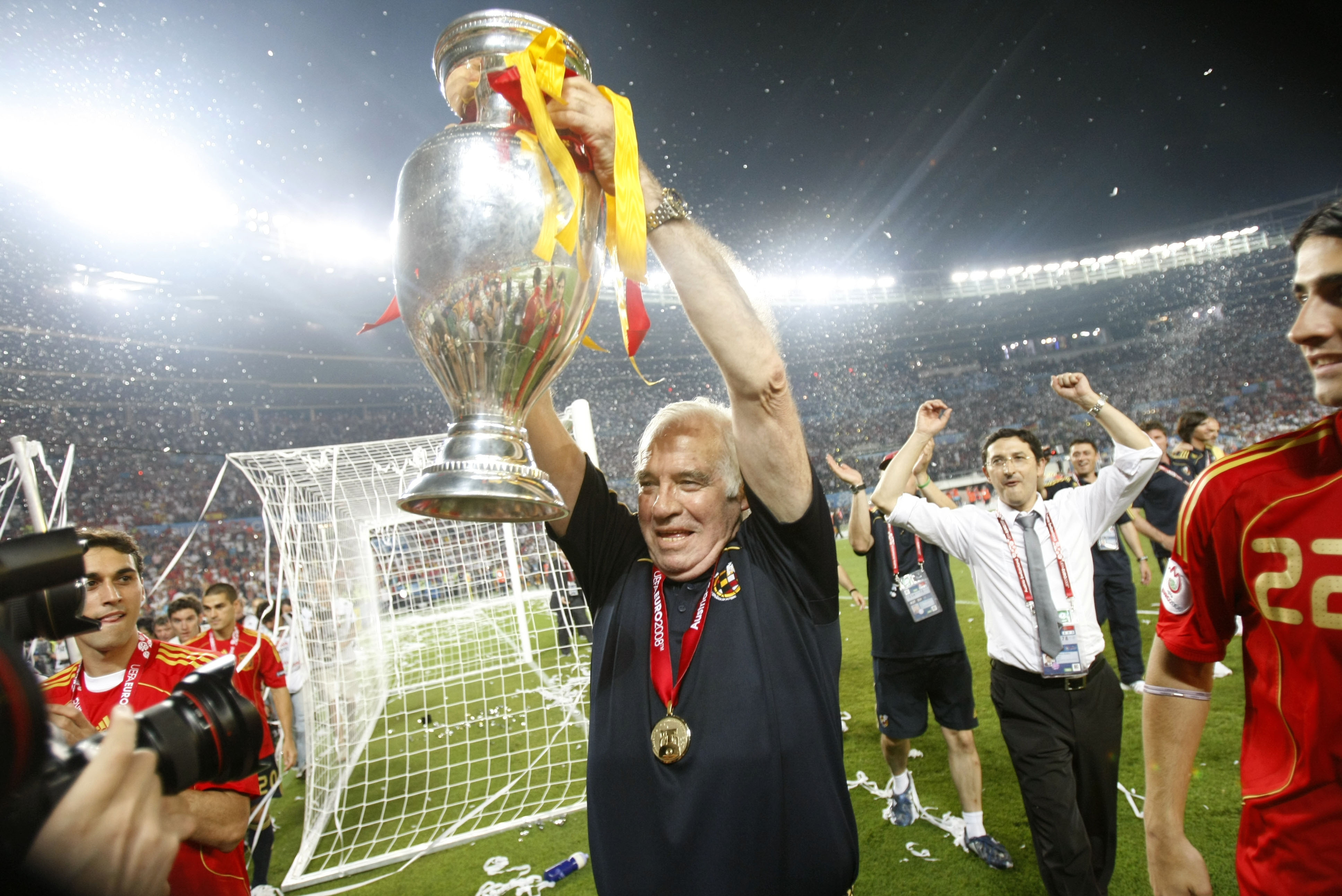 Spain's head coach Luis Aragones celebrates with the trophy after the Euro 2008 final between Germany and Spain in the Ernst-Happel stadium in Vienna, Austria, Sunday, June 29, 2008, the last day of the European Soccer Championships in Austria and Switzerland. Spain defeated Germany 1-0. (AP Photo/Bernat Armangue)