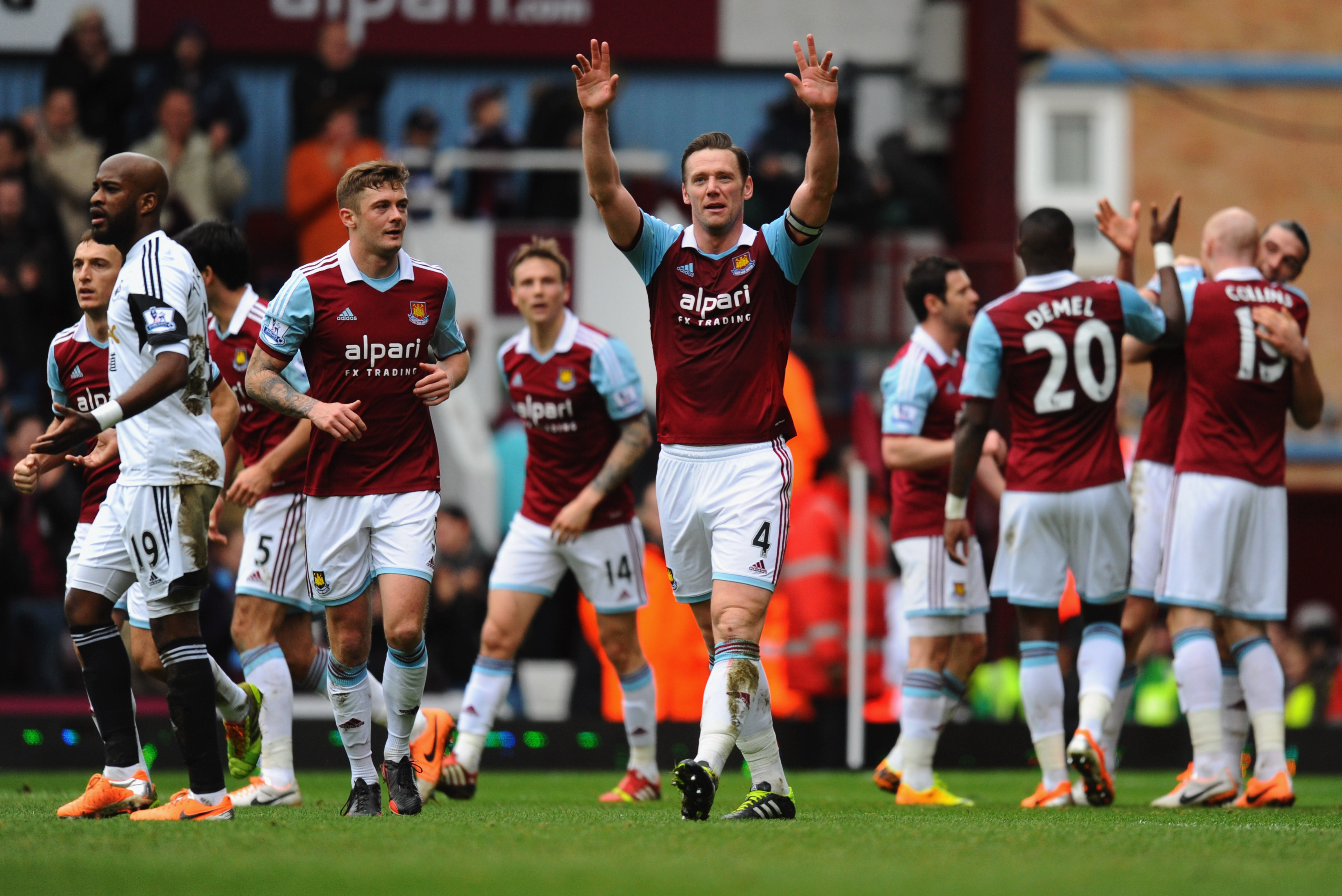 LONDON, ENGLAND - FEBRUARY 01:  Kevin Nolan of West Ham United (C) celebrates as he scores their second goal during the Barclays Premier League match between West Ham United and Swansea City at Boleyn Ground on February 1, 2014 in London, England.  (Photo by Mike Hewitt/Getty Images)