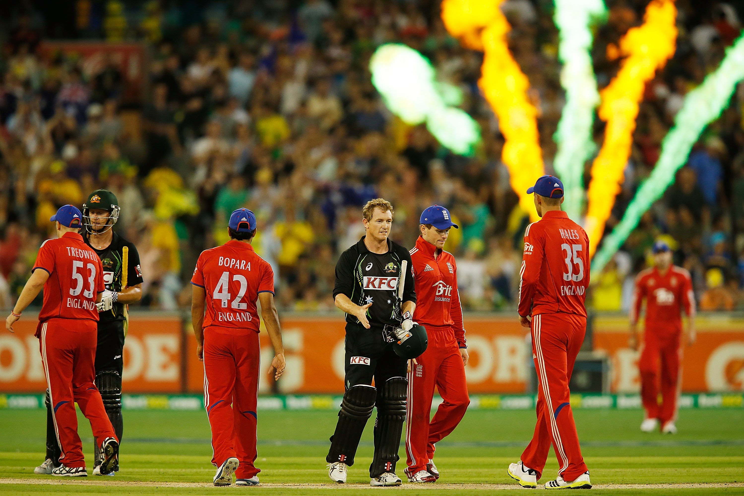 MELBOURNE, AUSTRALIA - JANUARY 31:  Cameron White and George Bailey of Australia shake hands with England players after winning game two of the International Twenty20 series between Australia and England at the Melbourne Cricket Ground on January 31, 2014 in Melbourne, Australia.  (Photo by Darrian Traynor/Getty Images)