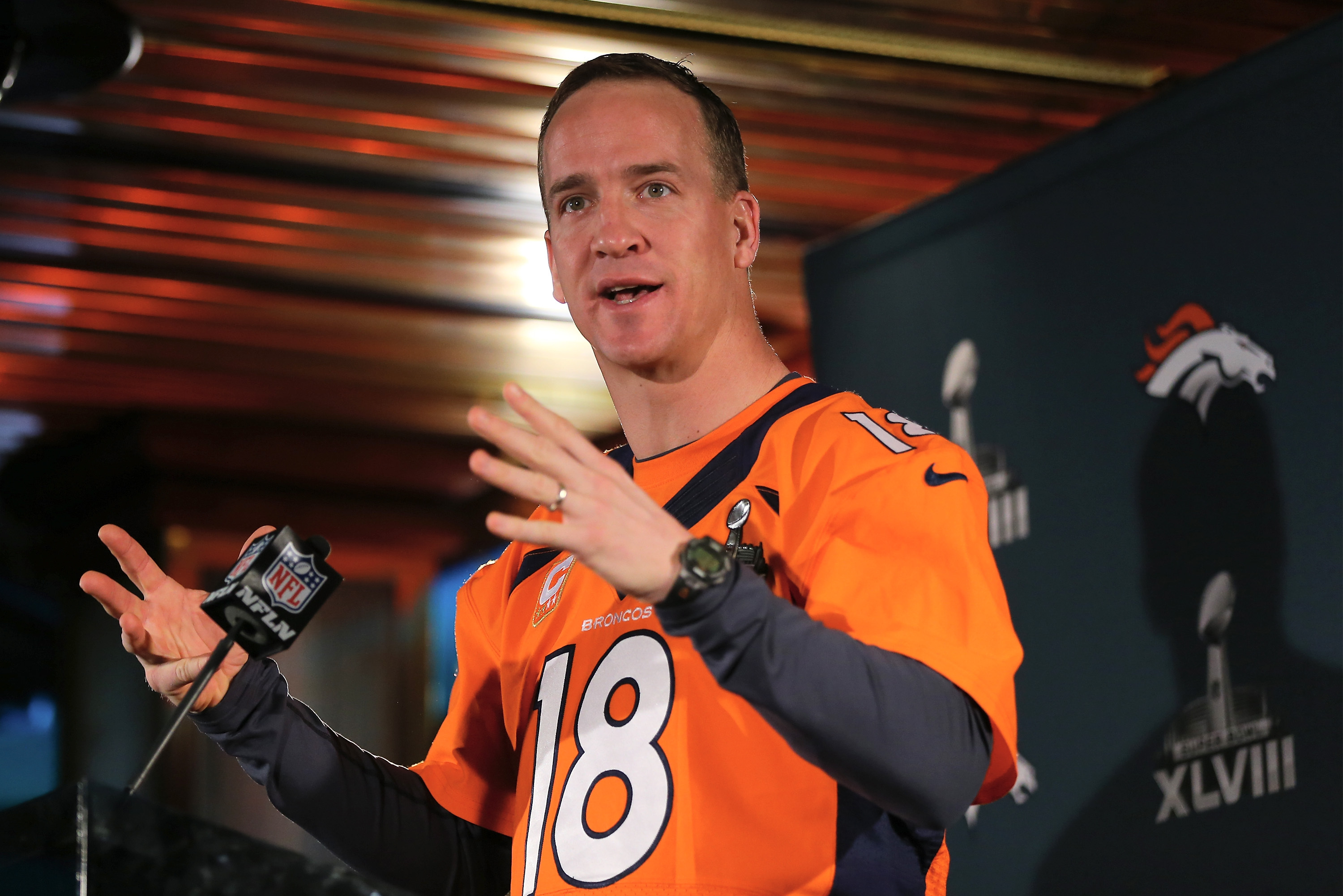 JERSEY CITY, NJ - JANUARY 30:  Peyton Manning of the Denver Broncos addresses the media during Super Bowl XLVIII media availability on January 30, 2014 in Jersey City, New Jersey. The Denver Broncos and Seattle Seahawks will meet in Super Bowl XLVIII at Metlife Stadium on February 2, 2014.  (Photo by Elsa/Getty Images)