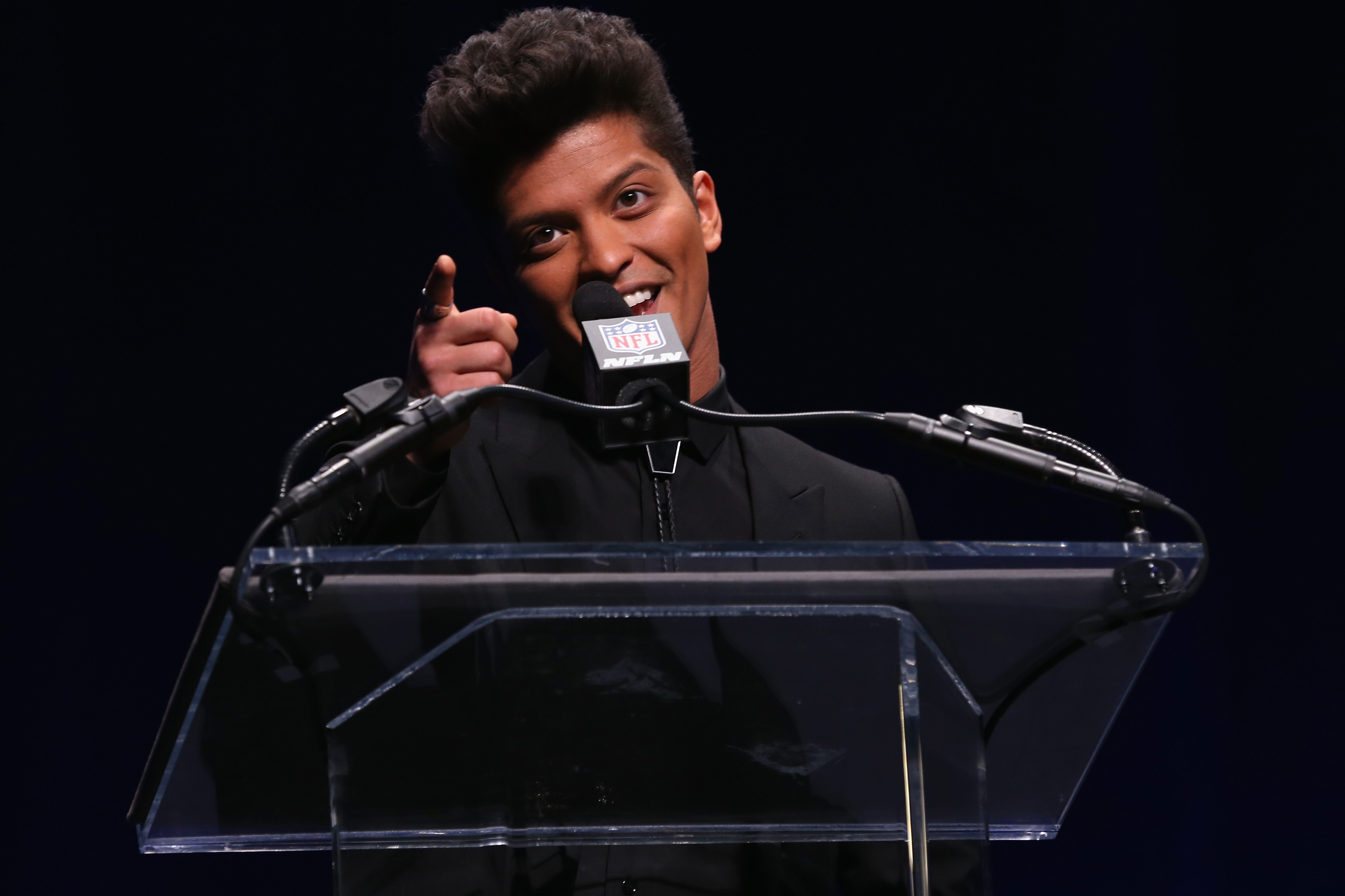 NEW YORK, NY - JANUARY 30:  Halftime performer Bruno Mars speaks at the Pepsi Super Bowl XLVIII Halftime Show Press Conference at Rose Theater, Jazz at Lincoln Center on January 30, 2014 in New York City.  (Photo by Larry Busacca/Getty Images)