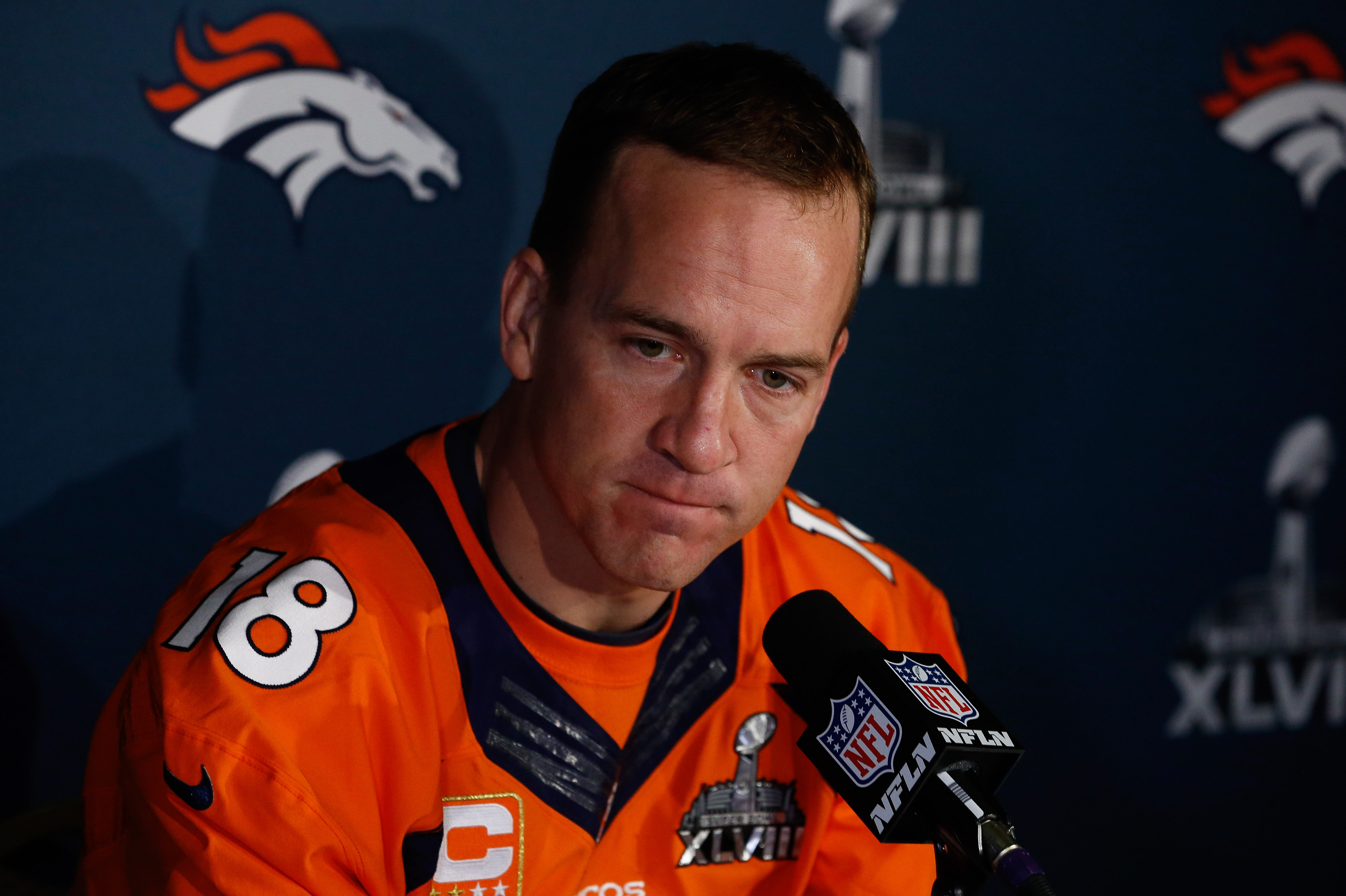 JERSEY CITY, NJ - JANUARY 29:    Peyton Manning #18 of the Denver Broncos speaks to the media during an availability January 29, 2014 in Jersey City, New Jersey. The Denver Broncos and Seattle Seahawks will meet at Super Bowl XLVIII at Metlife Stadium on February 2, 2014. (Photo by Jeff Zelevansky/Getty Images)