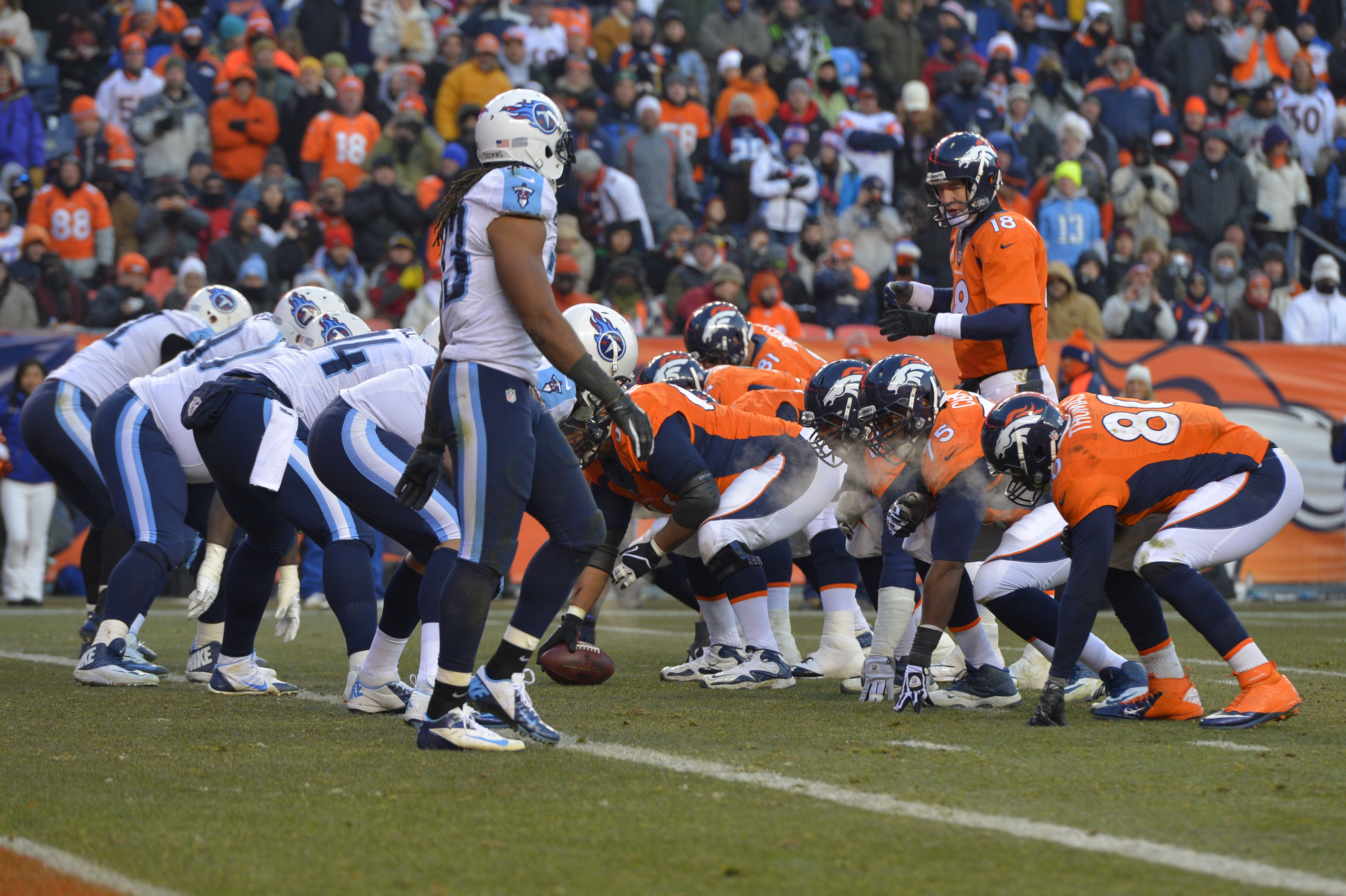 Denver Broncos quarterback Peyton Manning lines up with the offense at the goal line against the Tennessee Titans during the second half of an NFL football game on Sunday, Dec. 8, 2013, in Denver. (AP Photo/Jack Dempsey)