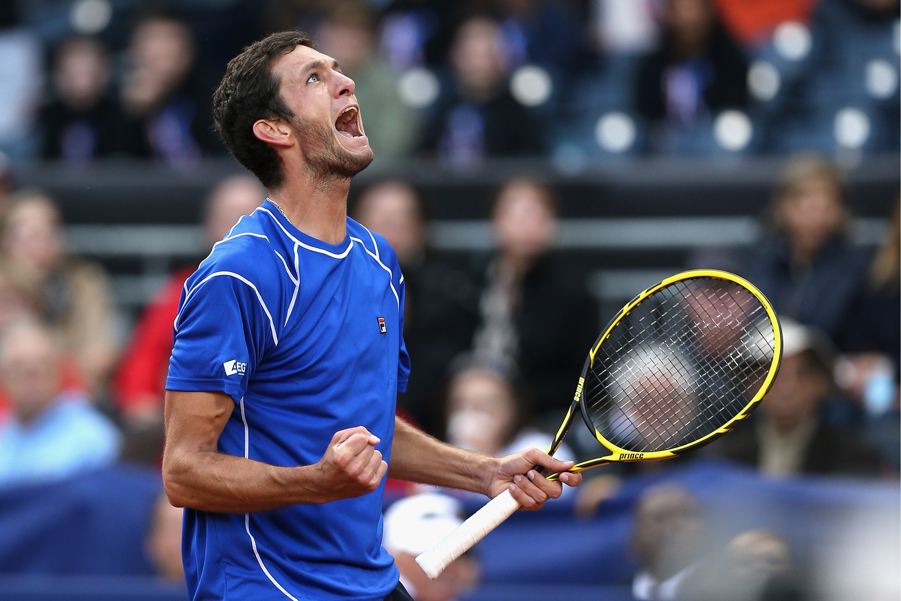 SAN DIEGO, CA - JANUARY 31:  James Ward of  Great Britain celebrates match point after his five set victory against Sam Querrey of the United States during day one of the Davis Cup World Group first round between the U.S. and Great Britain at PETCO Park on January 31, 2014 in San Diego, California.  (Photo by Clive Brunskill/Getty Images)