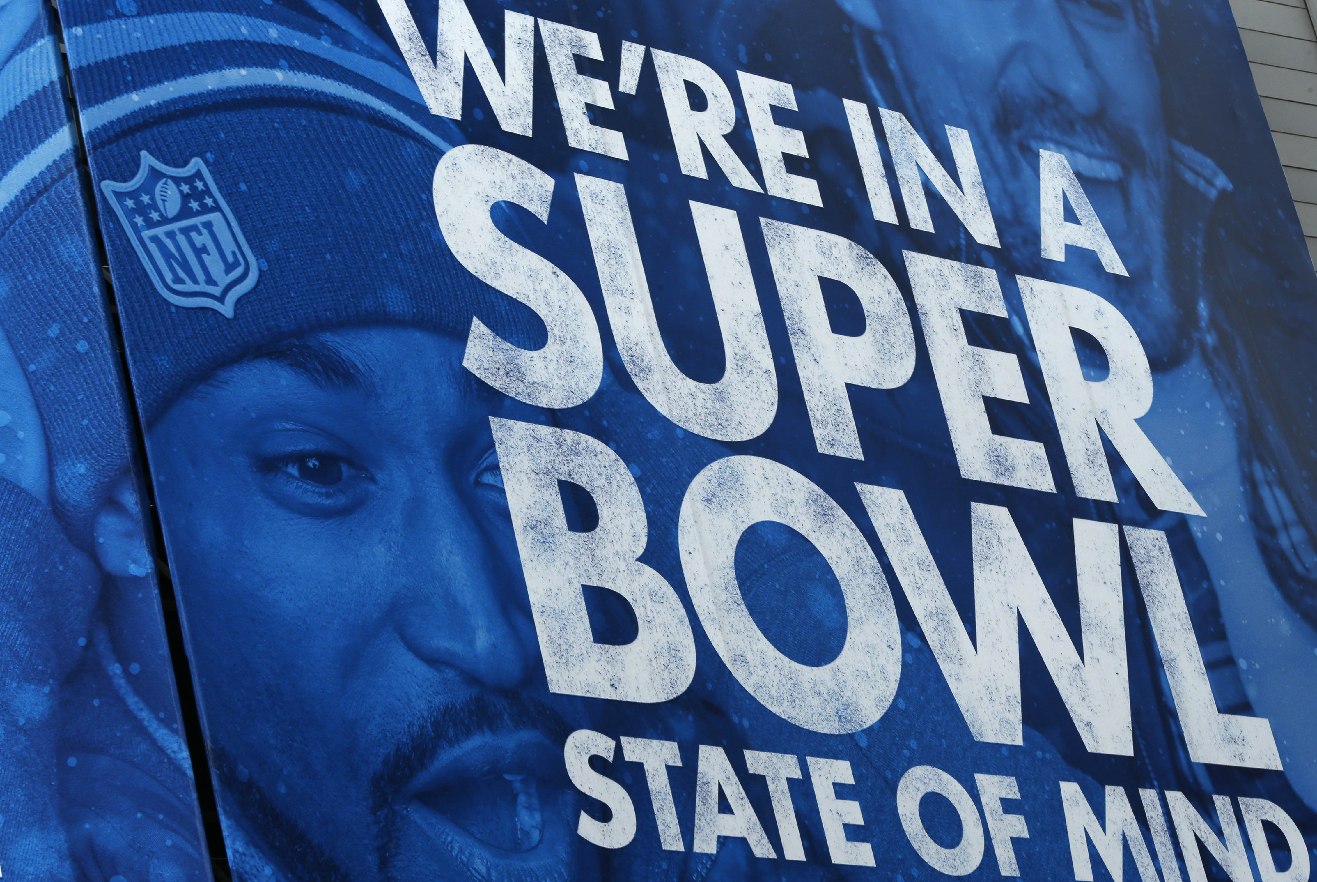 A billboard is displayed along Super Bowl Boulevard in Times Square in New York on Friday, Jan. 31, 2014. The Seattle Seahawks play the Denver Broncos on Sunday at the stadium in the NFL Super Bowl XLVIII football game. (AP Photo/Paul Sancya)