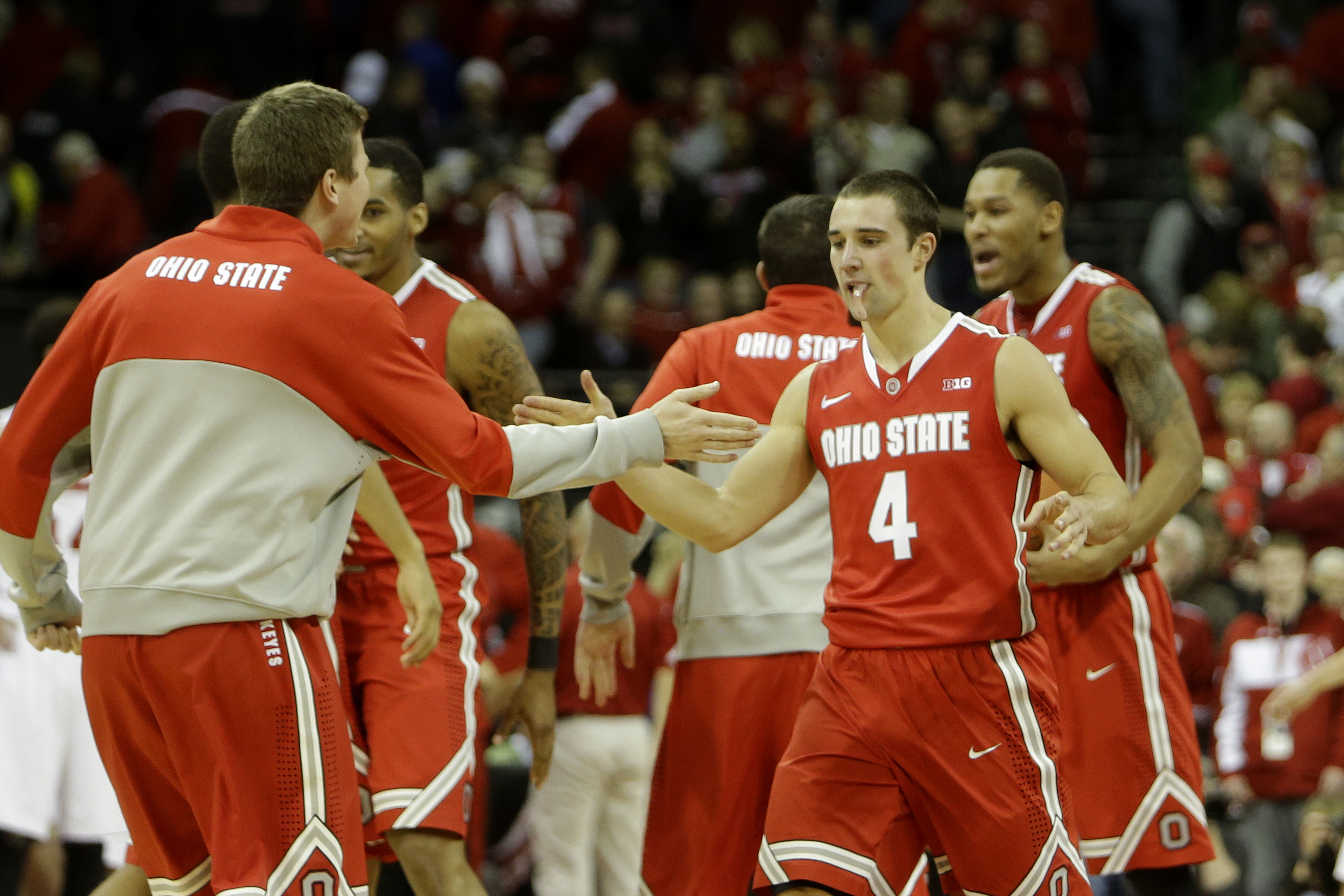 MADISON, WI - FEBRUARY 01: Aaron Craft #4 of the Ohio State Buckeyes celebrates after the win over the Wisconsin Badgers at Kohl Center on February 01, 2014 in Madison, Wisconsin. (Photo by Mike McGinnis/Getty Images)