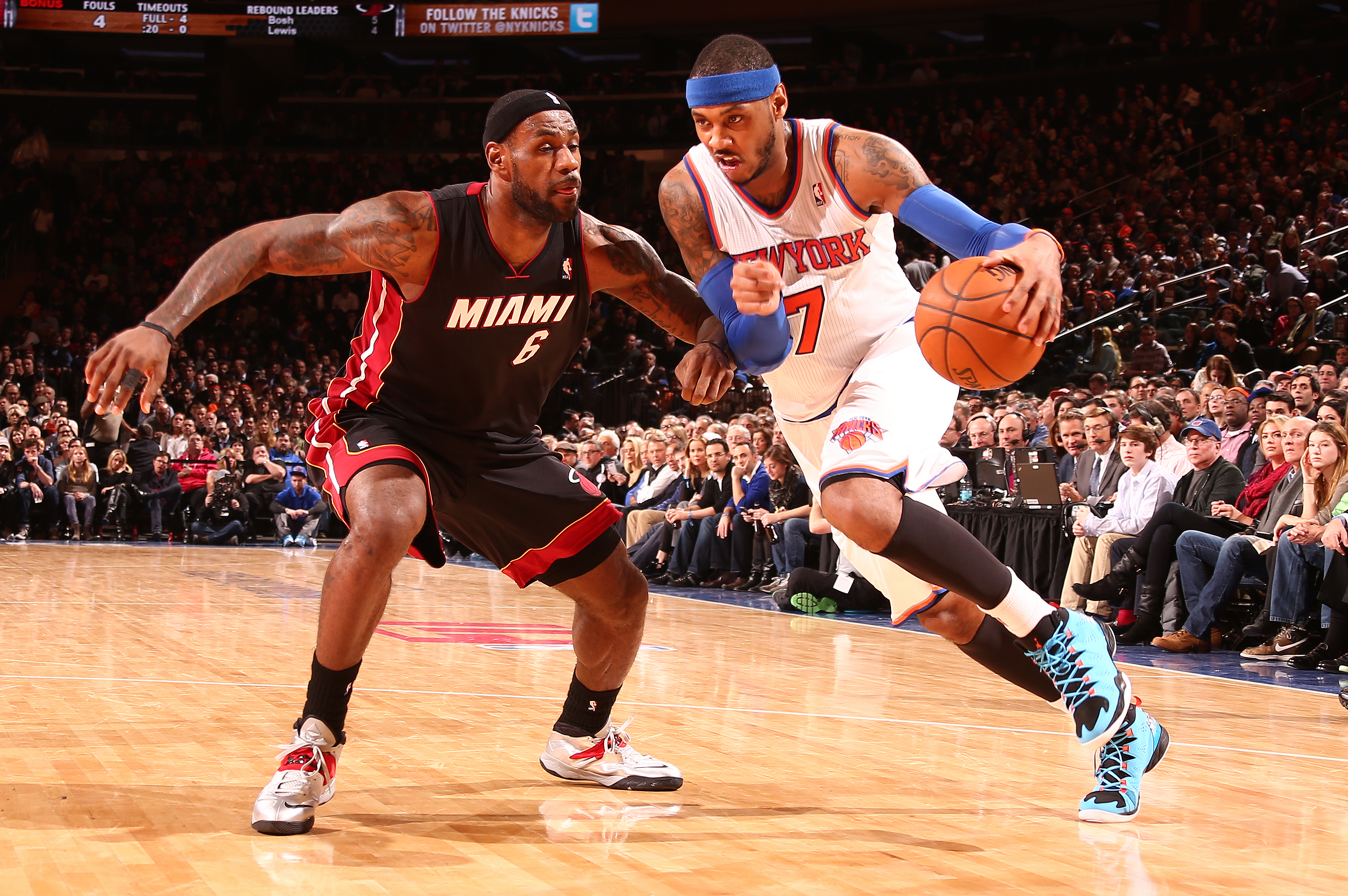 NEW YORK, NY - JANUARY 9: Carmelo Anthony #7 of the New York Knicks drives to the basket against LeBron James #6 of the Miami Heat during a game at Madison Square Garden in New York City on January 9, 2014.  NOTE TO USER: User expressly acknowledges and agrees that, by downloading and or using this photograph, User is consenting to the terms and conditions of the Getty Images License Agreement. Mandatory Copyright Notice: Copyright 2014 NBAE  (Photo by Nathaniel S. Butler/NBAE via Getty Images)