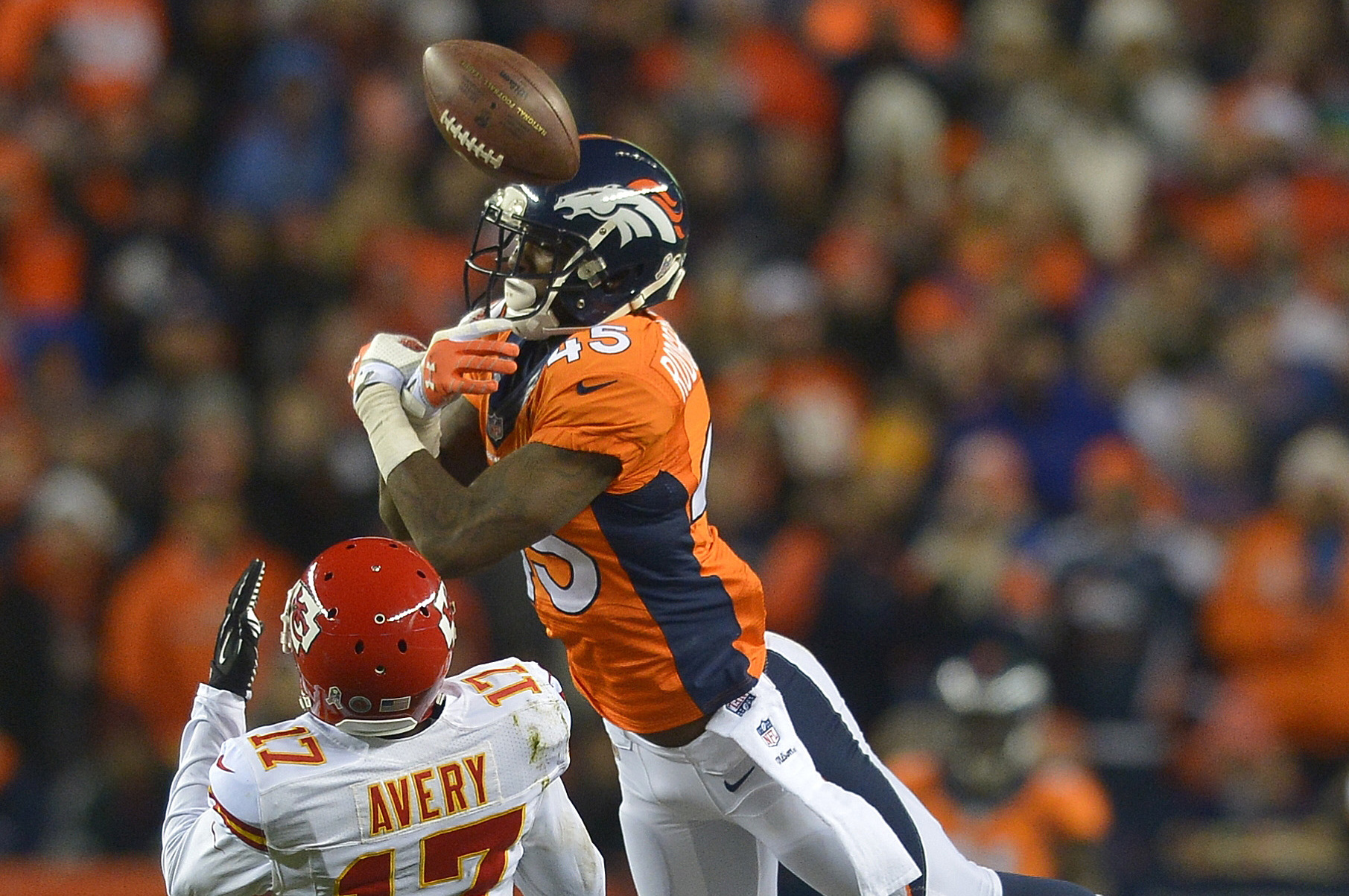 Denver Broncos cornerback Dominique Rodgers-Cromartie (45) breaks up a pass intended for Kansas City Chiefs wide receiver Donnie Avery (17) in the third quarter of an NFL football game, Sunday, Nov. 17, 2013, in Denver. (AP Photo/Jack Dempsey)