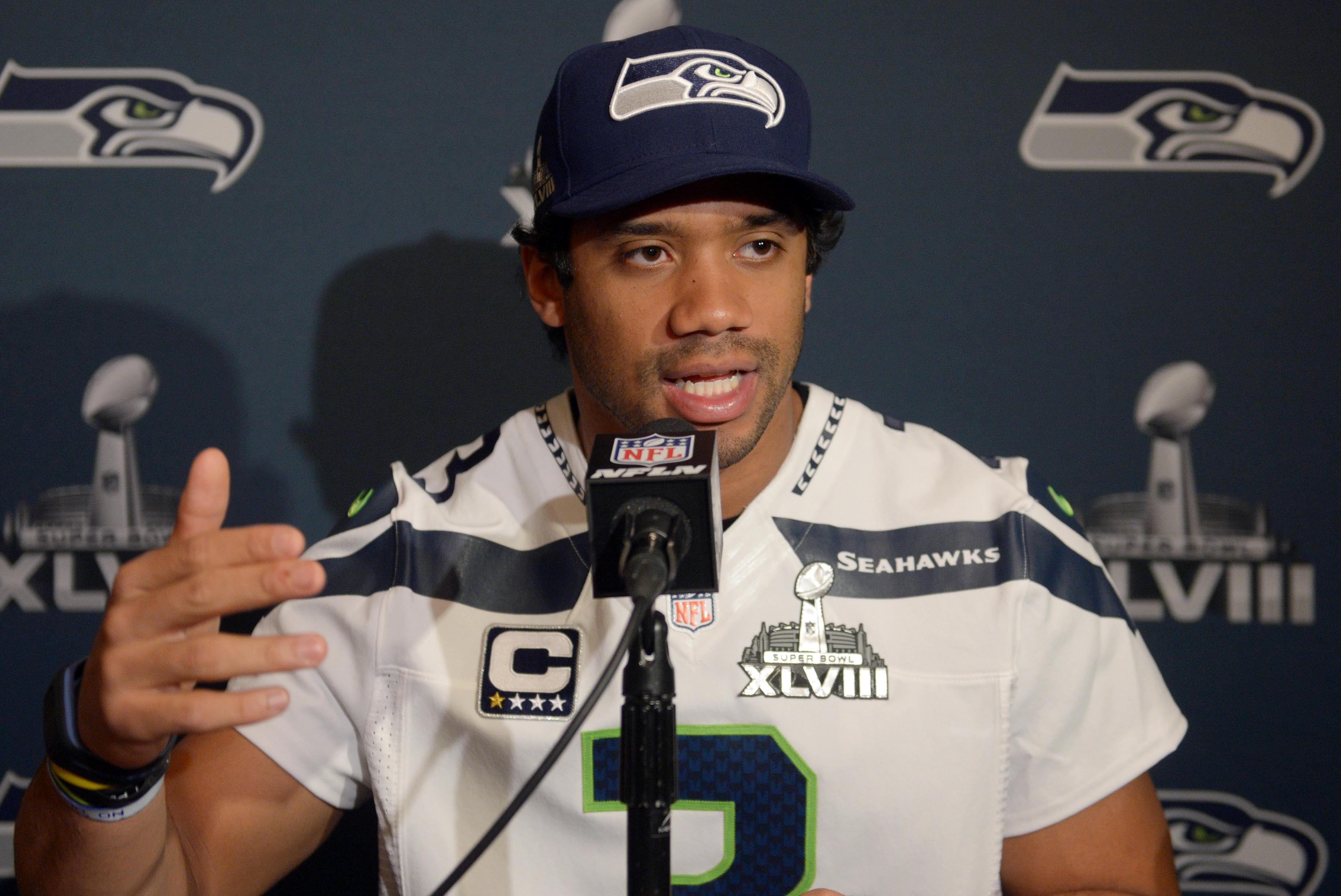 Jan 30, 2014; Jersey City, NJ, USA; Seattle Seahawks quarterback Russell Wilson (3) at a press conference at The Westin in advance of Super Bowl XLVIII. Mandatory Credit: Kirby Lee-USA TODAY Sports