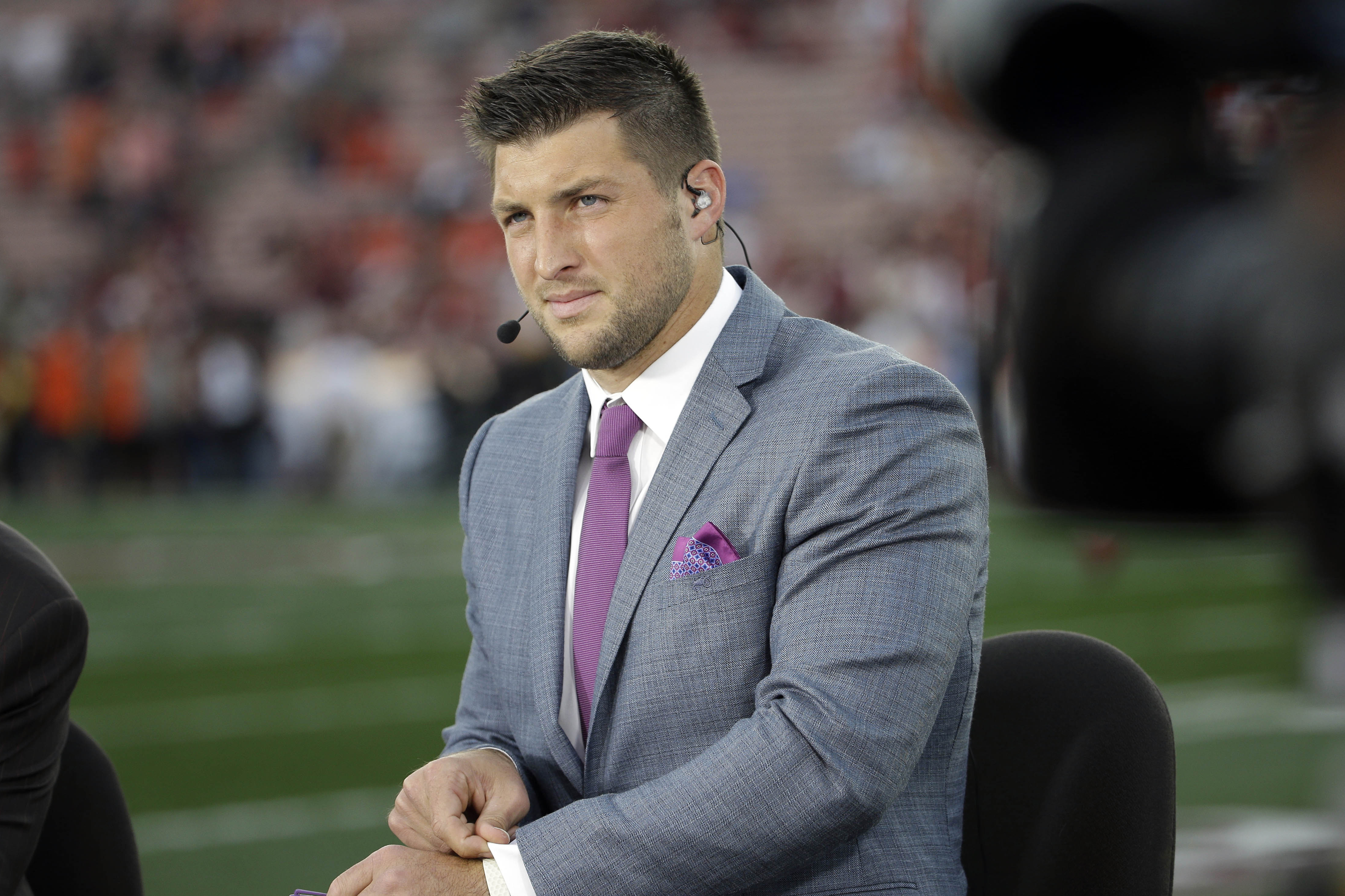 FILE - In this Jan. 6, 2014 file, photo shows Tim Tebow on ESPN before the NCAA BCS National Championship college football game between Auburn and Florida State in Pasadena, Calif. Tebow will be a special guest on ABC's