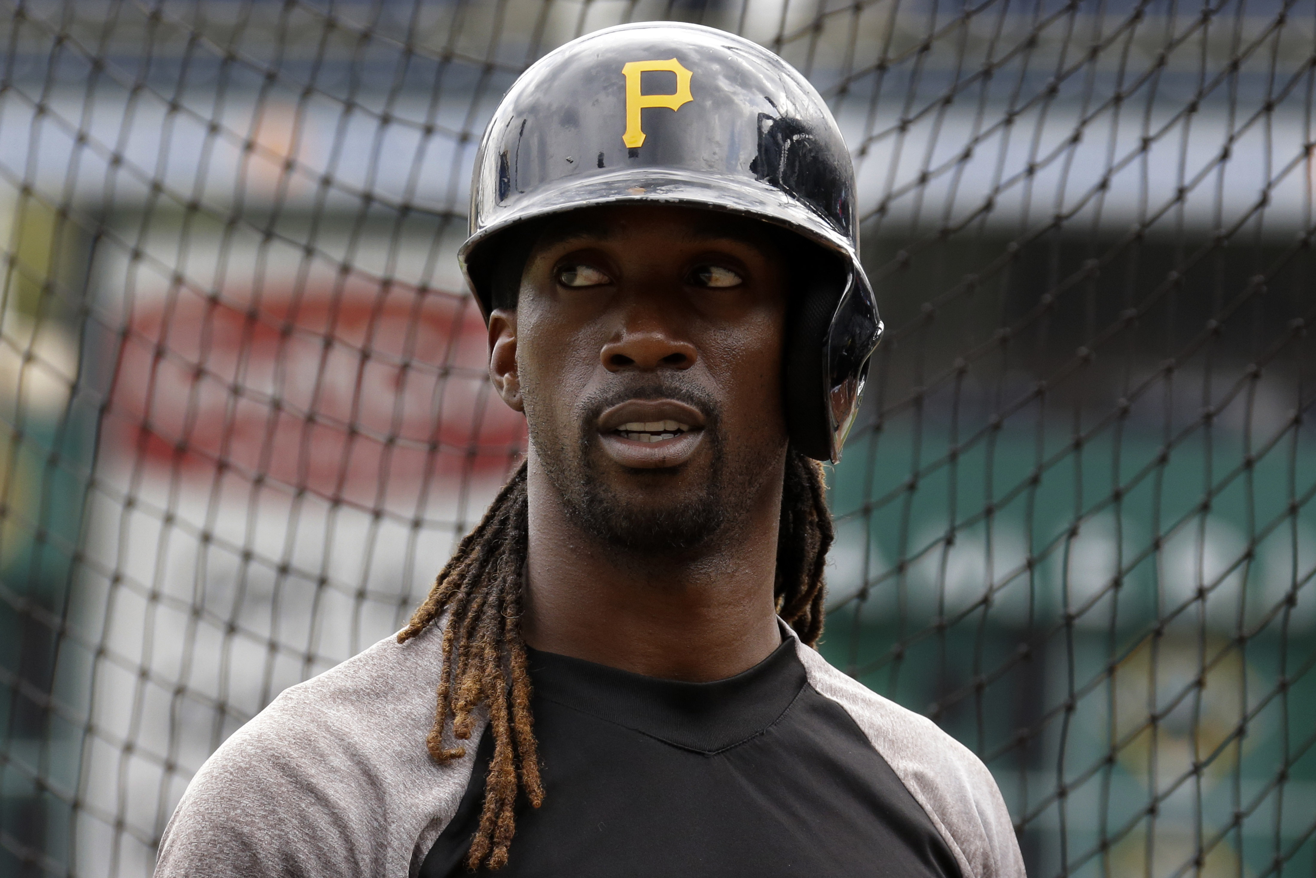 Pittsburgh Pirates' Andrew McCutchen waits his turn in the batting cage during a baseball workout in Pittsburgh Saturday, Oct. 5, 2013. The Pirates are scheduled to play the St. Louis Cardinals in Game 3 of the National League division series on Sunday. (AP Photo/Gene J. Puskar)