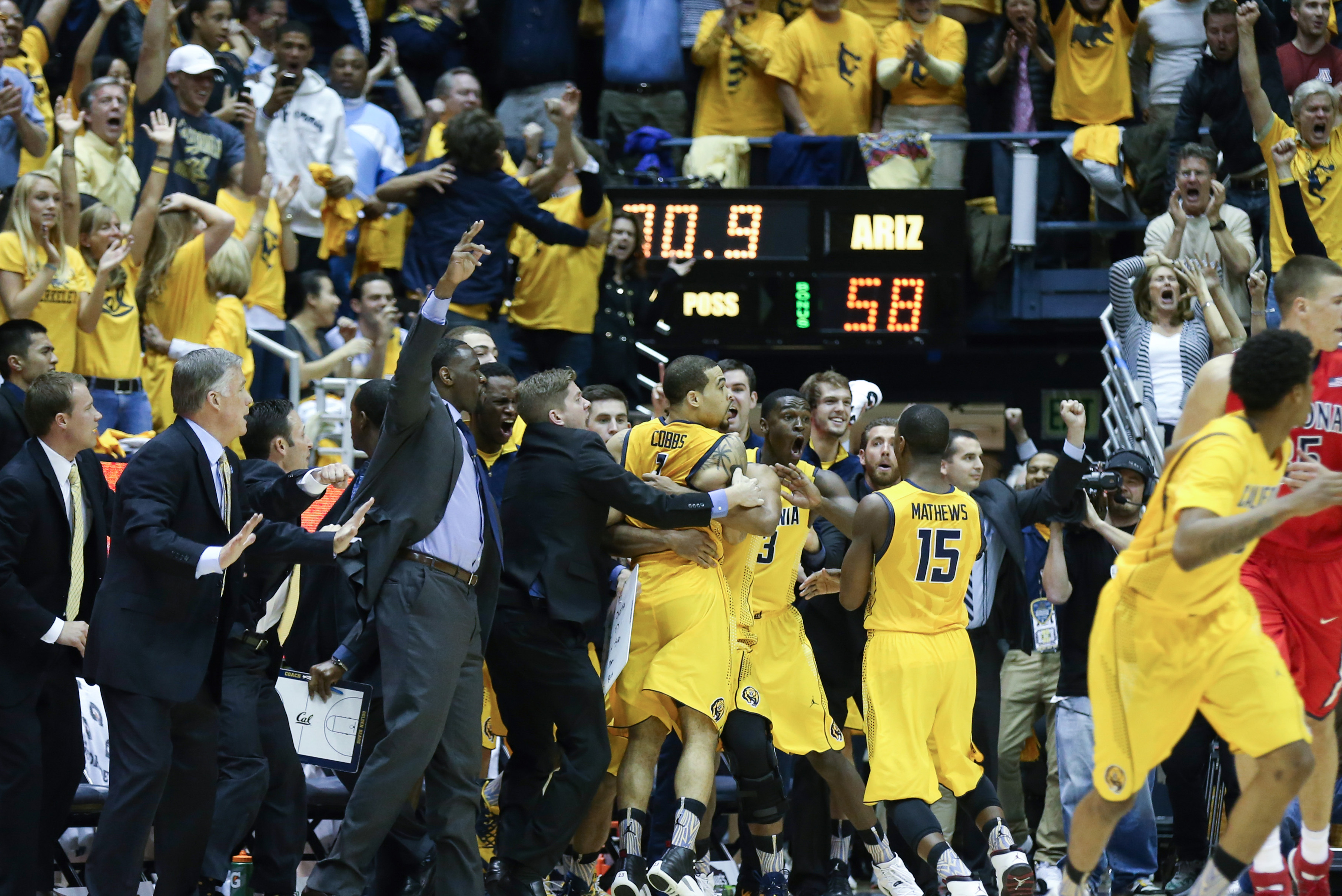 Feb 1, 2014; Berkeley, CA, USA; California Golden Bears celebrate after guard Justin Cobbs (1) scores the game winning shot against the Arizona Wildcats during the second half at Haas Pavilion. The California Golden Bears defeated the Arizona Wildcats 60-58. Mandatory Credit: Kelley L Cox-USA TODAY Sports