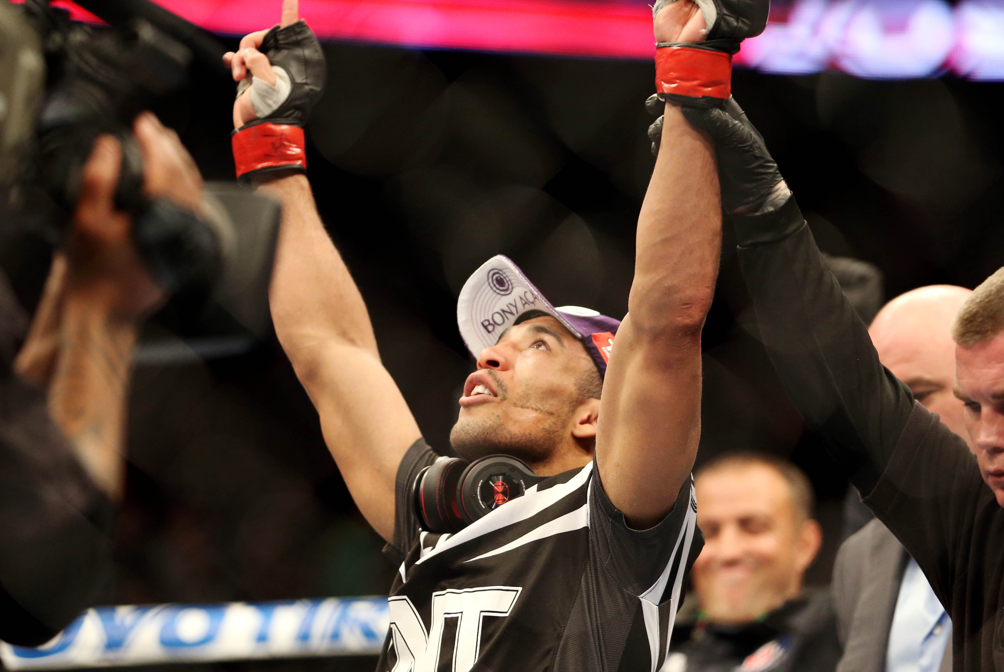 Feb 1, 2014; Newark, NJ, USA; Jose Aldo (red gloves) celebrates beating Ricardo Lamas (blue gloves) during UFC 169 at Prudential Center. Mandatory Credit: Joe Camporeale-USA TODAY Sports