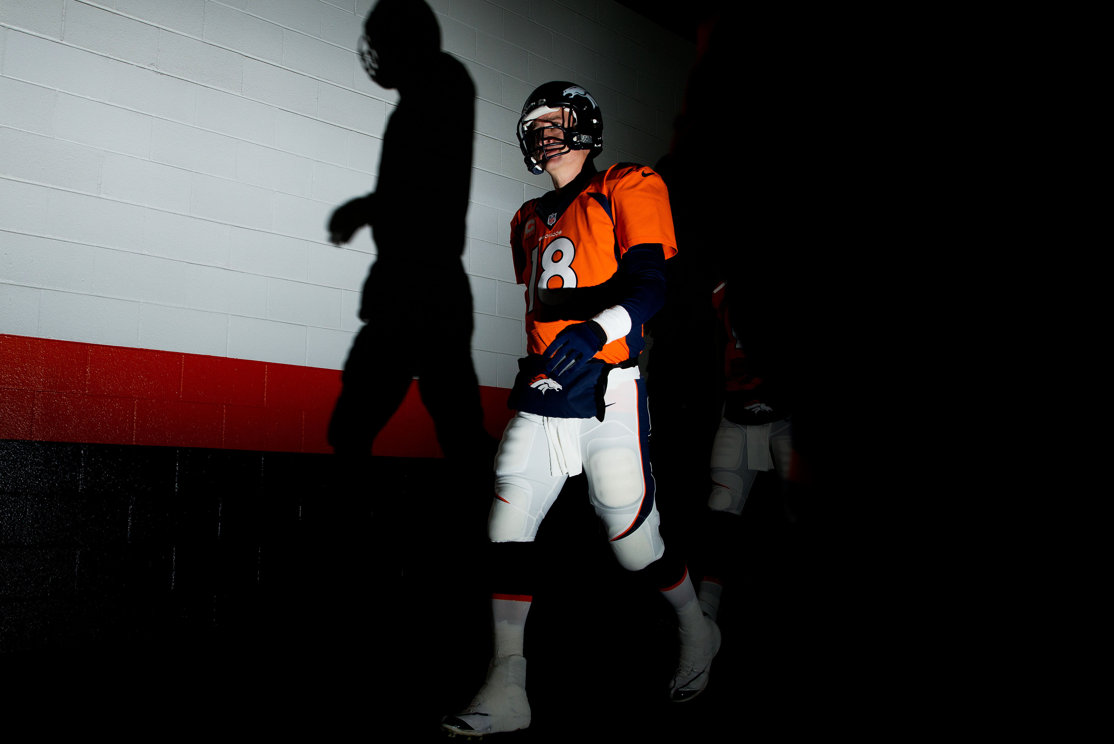 DENVER, CO - DECEMBER 12:   Peyton Manning #18 of the Denver Broncos prepares for their game against the San Diego Chargers at Sports Authority Field at Mile High on December 12, 2013 in Denver, Colorado.  (Photo by Justin Edmonds/Getty Images)