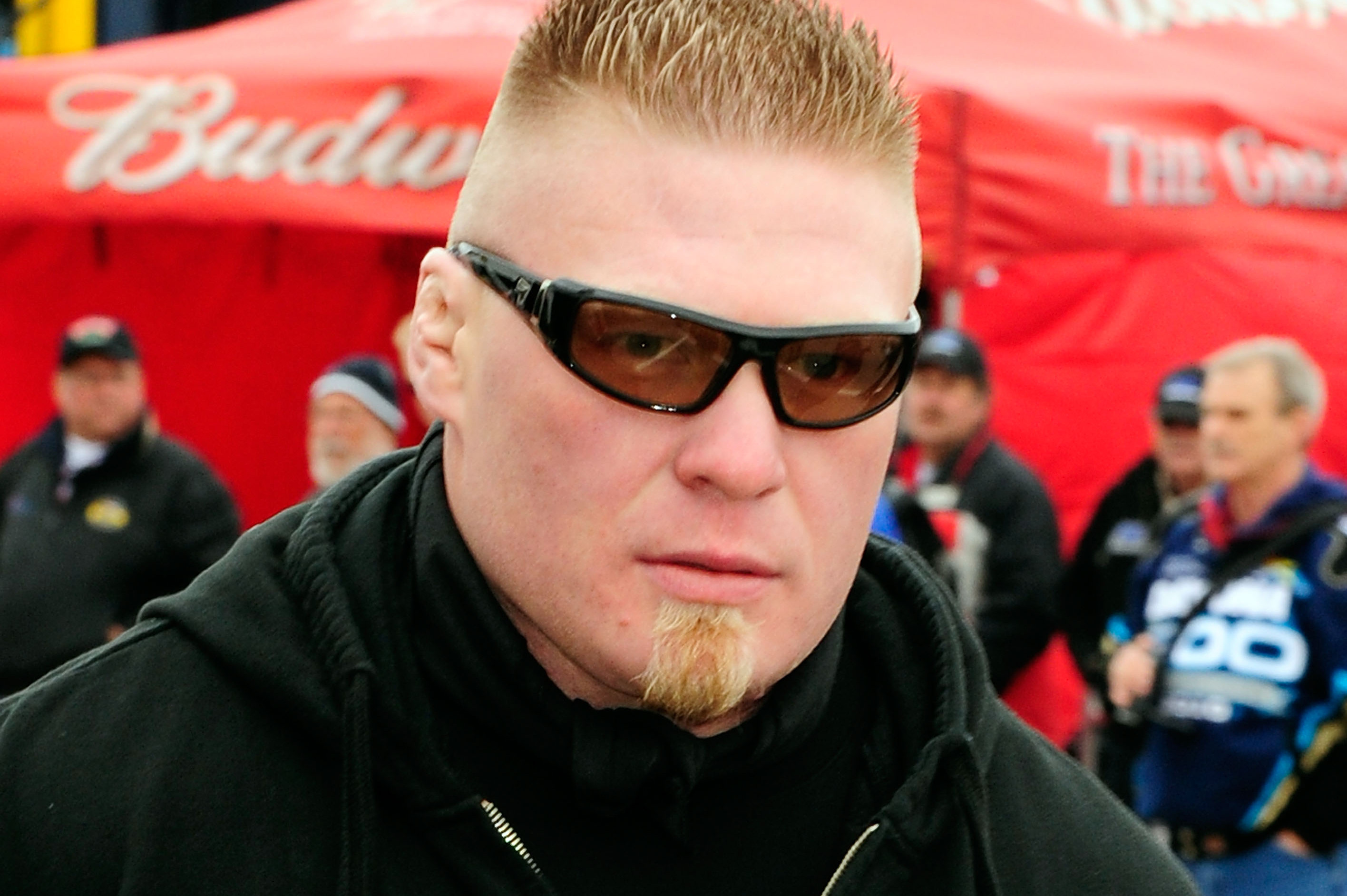 DAYTONA BEACH, FL - FEBRUARY 13:  MMA fighter Brock Lesnar walks in the garage area during practice for the Daytona 500 at Daytona International Speedway on February 13, 2010 in Daytona Beach, Florida.  (Photo by Sam Greenwood/Getty Images for NASCAR)