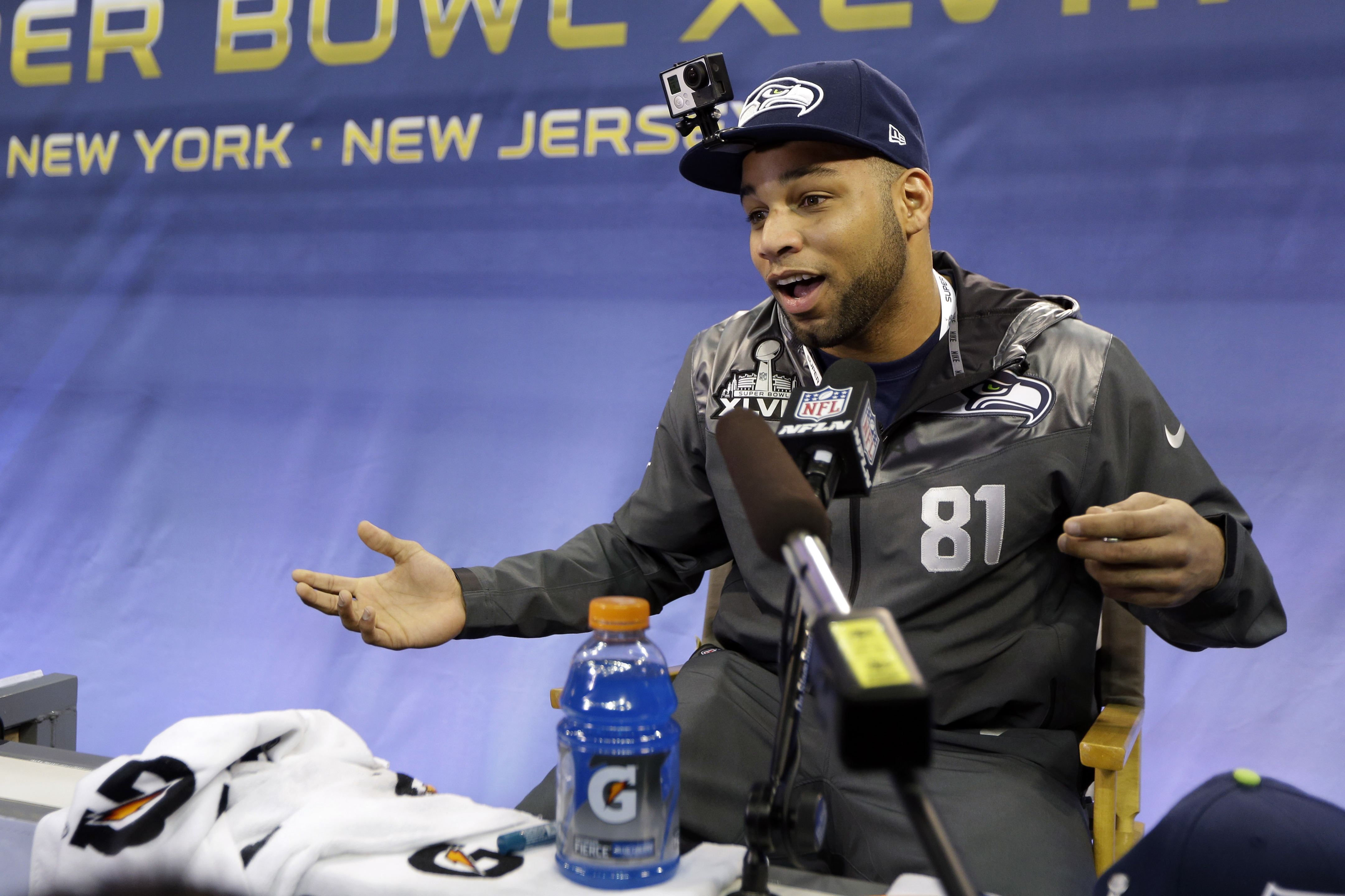 Seattle Seahawks' Golden Tate answers a question during media day for the NFL Super Bowl XLVIII football game Tuesday, Jan. 28, 2014, in Newark, N.J. (AP Photo/Jeff Roberson)