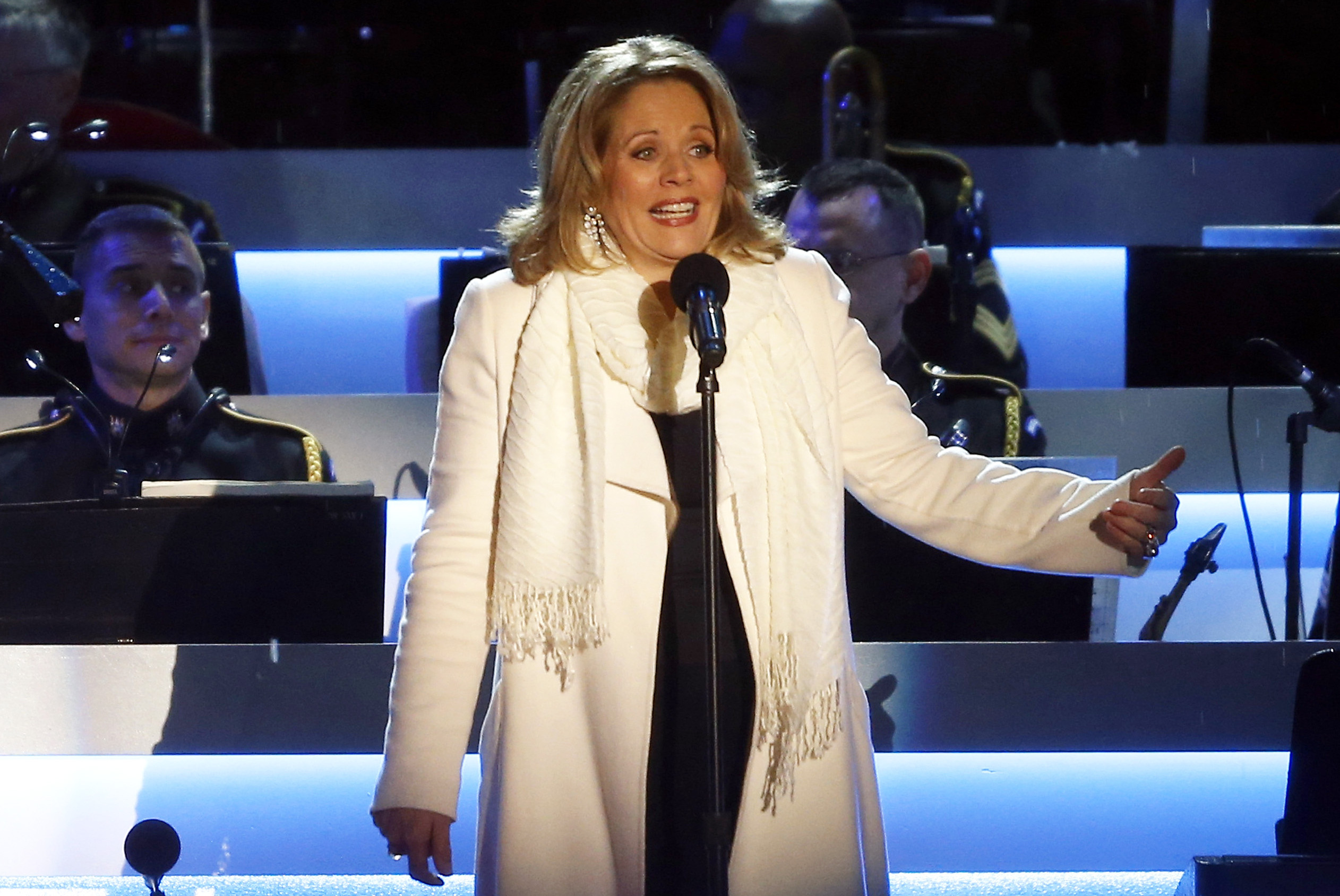 FILE - This Dec. 6, 2013 file photo shows Renee Fleming performing at the National Christmas Tree lighting ceremony across from the White House in Washington. Fleming, a four-time Grammy winner, will perform sing the national anthem before the Denver Broncos take on the Seattle Seahawks at MetLife Stadium in East Rutherford, N.J. on Feb 2. (AP Photo/Charles Dharapak, File)