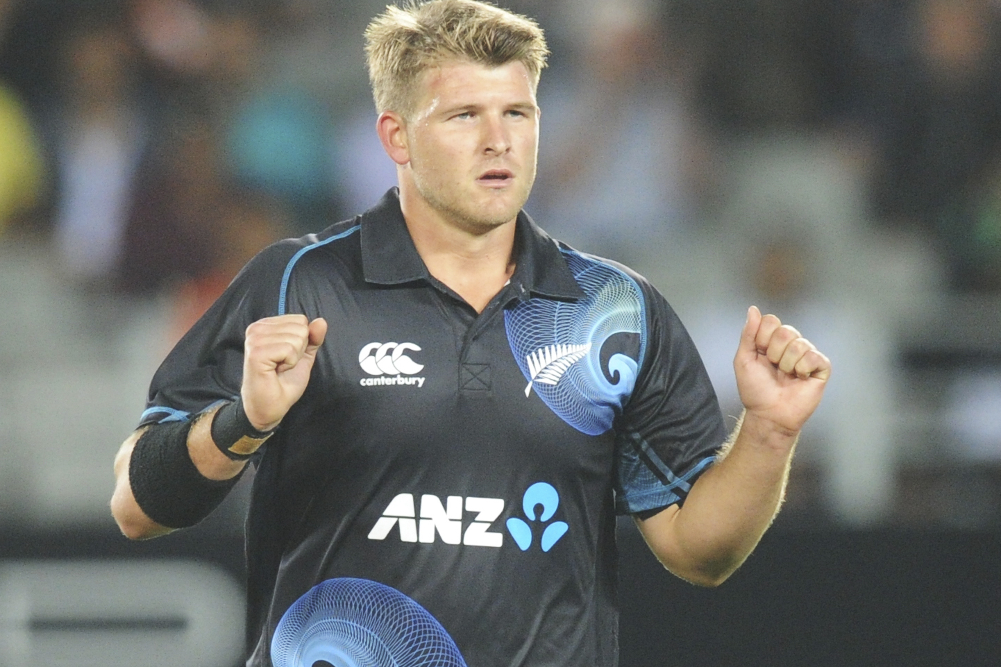 New Zealand's Corey Anderson celebrates his bag of 5 wickets with the dismissal of India's Mohammed Sami for 2 during the third one day International cricket match at Eden Park in Auckland, New Zealand, Saturday, Jan. 25, 2014. (AP Photo/SNPA, Ross Setford) NEW ZEALAND OUT
