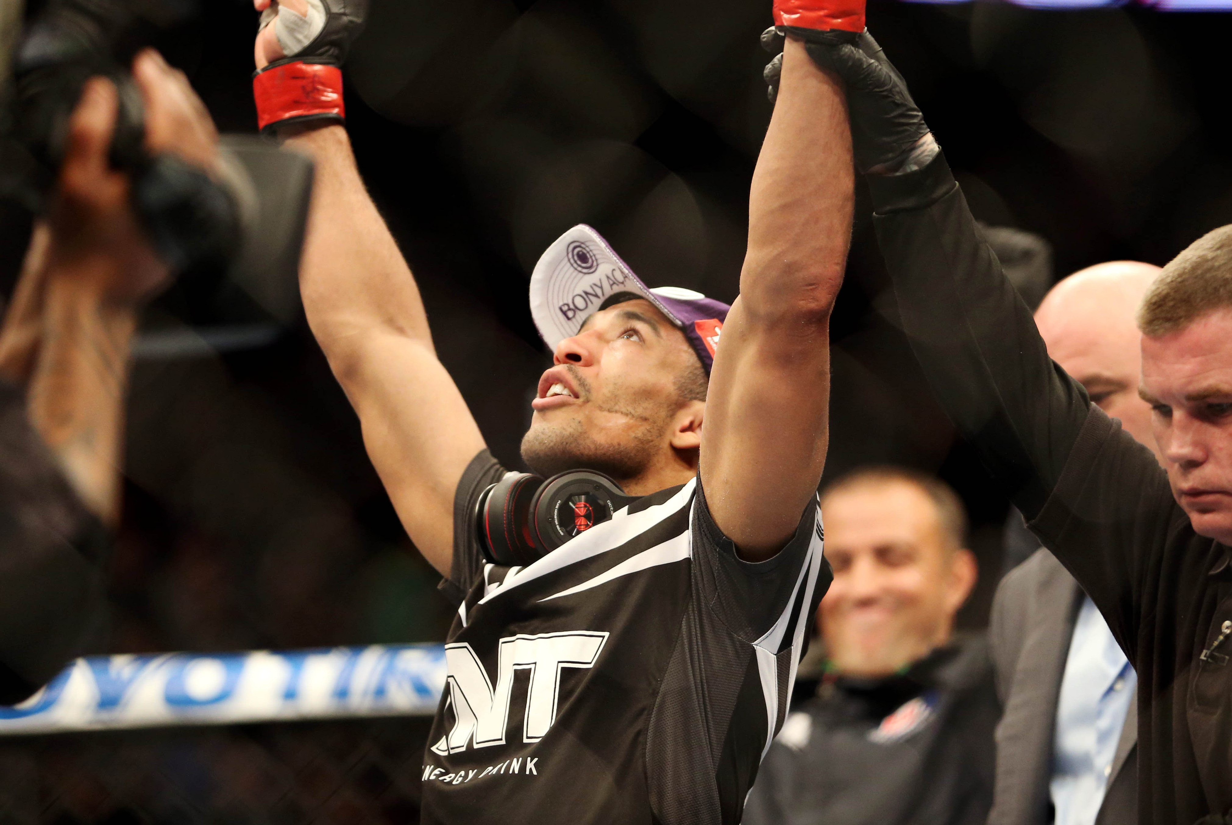 Feb 1, 2014; Newark, NJ, USA; Jose Aldo (red gloves) celebrates beating Ricardo Lamas (blue gloves) during UFC 169 at Prudential Center. Mandatory Credit: Joe Camporeale-USA TODAY Sports