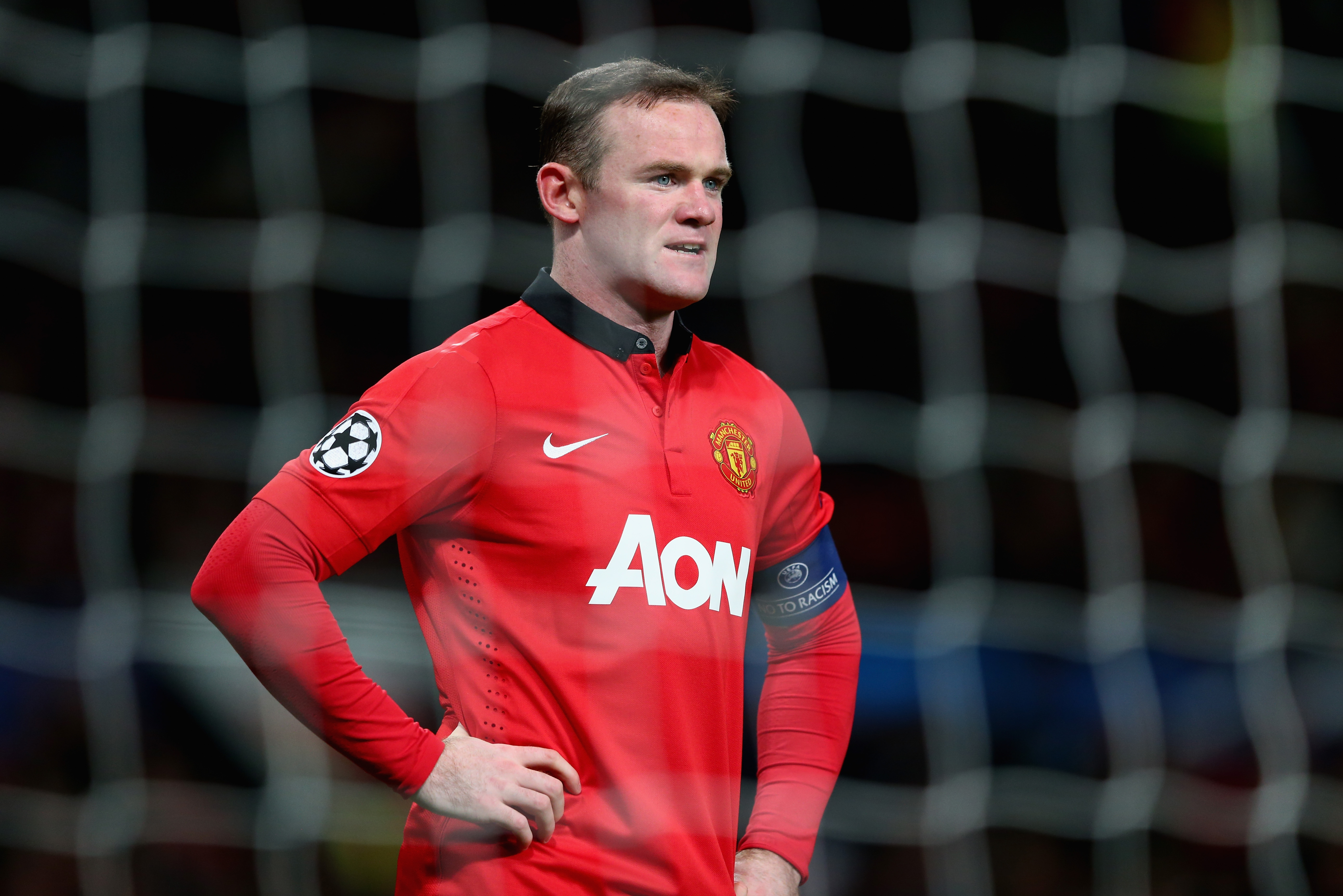 MANCHESTER, ENGLAND - DECEMBER 10:  Wayne Rooney of Manchester United looks on during the UEFA Champions League Group A match between Manchester United and Shakhtar Donetsk at Old Trafford on December 10, 2013 in Manchester, England.  (Photo by Michael Steele/Getty Images)