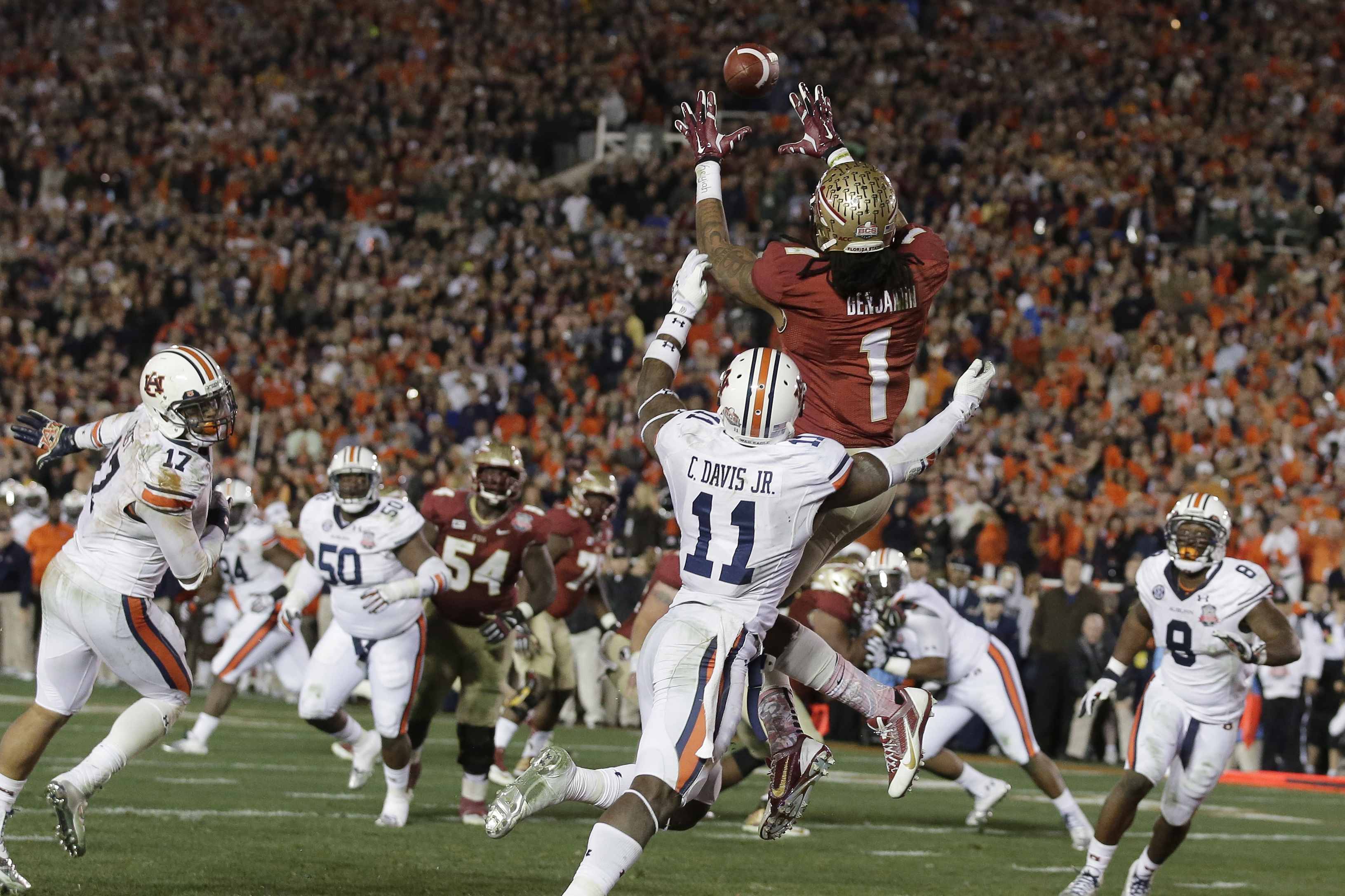 Florida State's Kelvin Benjamin catches the game-winning touchdown pass during the second half of the NCAA BCS National Championship college football game against Auburn Monday, Jan. 6, 2014, in Pasadena, Calif. (AP Photo/Chris Carlson)