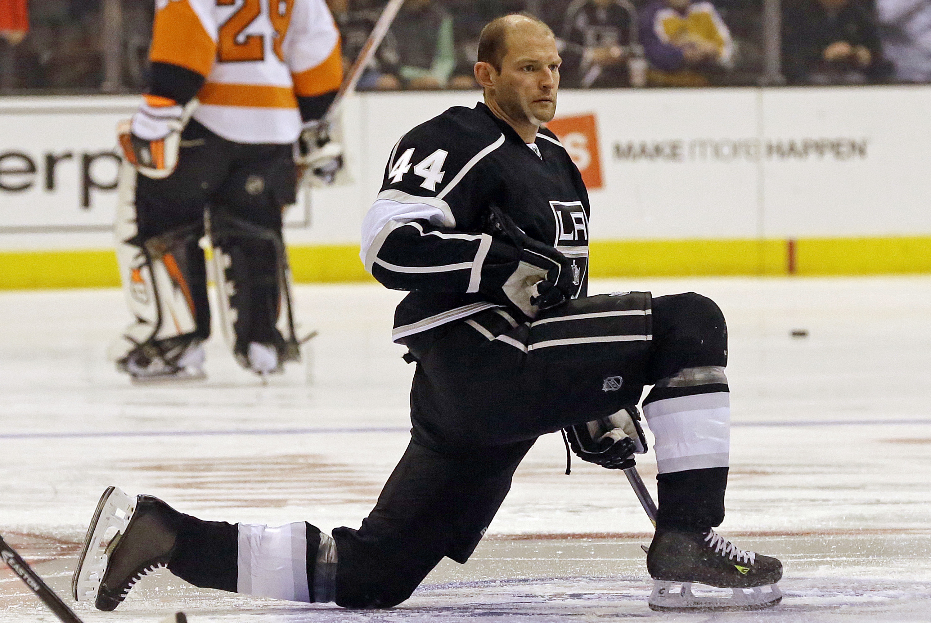 Los Angeles Kings defenseman Robyn Regehr (44) warms up before his 1,000th NHL regular season NHL hockey game against the Philadelphia Flyers in Los Angeles Saturday, Feb. 1, 2014.  (AP Photo/Reed Saxon)