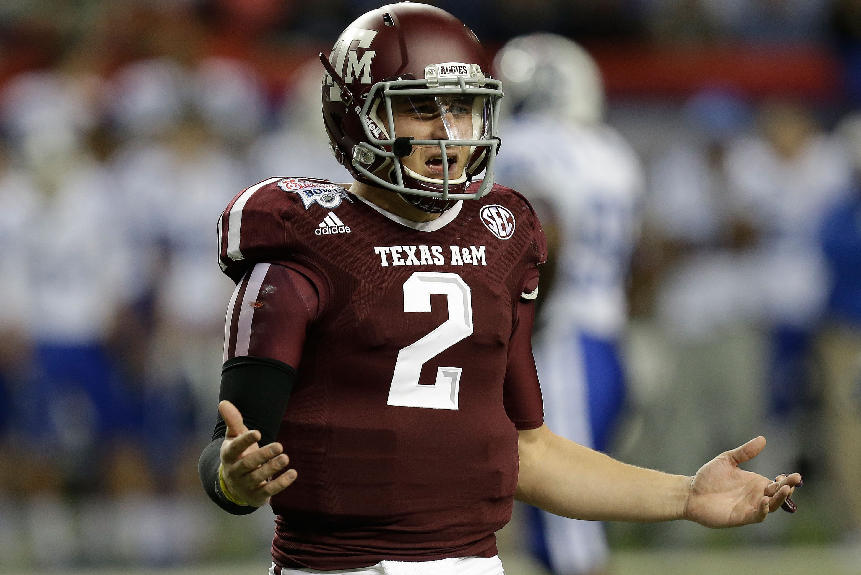 ATLANTA, GA - DECEMBER 31:  Quarterback Johnny Manziel #2 of the Texas A&M Aggies argues a call during the the Chick-fil-A Bowl game against the Duke Blue Devils at the Georgia Dome on December 31, 2013 in Atlanta, Georgia.  (Photo by Mike Zarrilli/Getty Images)