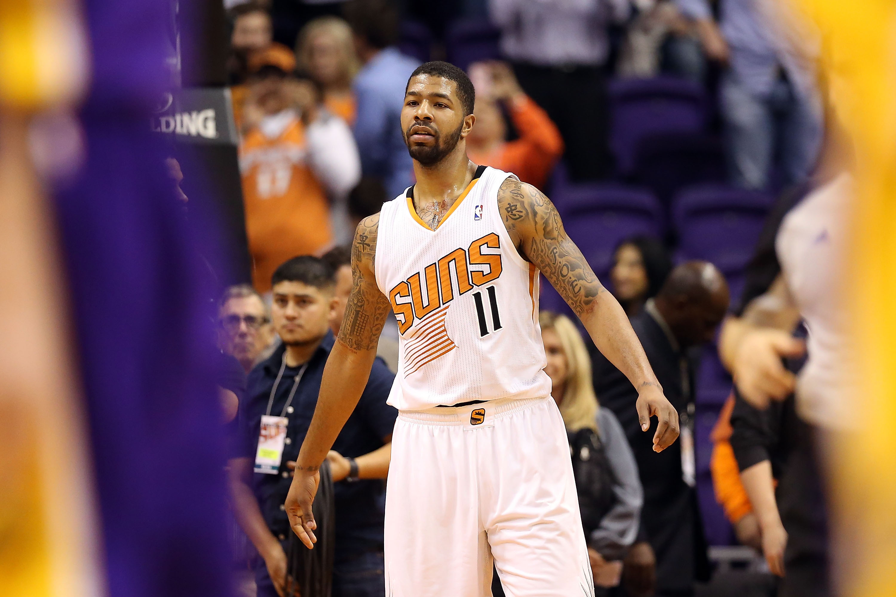 PHOENIX, AZ - JANUARY 15:  Markieff Morris #11 of the Phoenix Suns during the NBA game against the Los Angeles Lakers at US Airways Center on January 15, 2014 in Phoenix, Arizona.  The Suns defeated the Lakers 121-114. NOTE TO USER: User expressly acknowledges and agrees that, by downloading and or using this photograph, User is consenting to the terms and conditions of the Getty Images License Agreement.  (Photo by Christian Petersen/Getty Images)