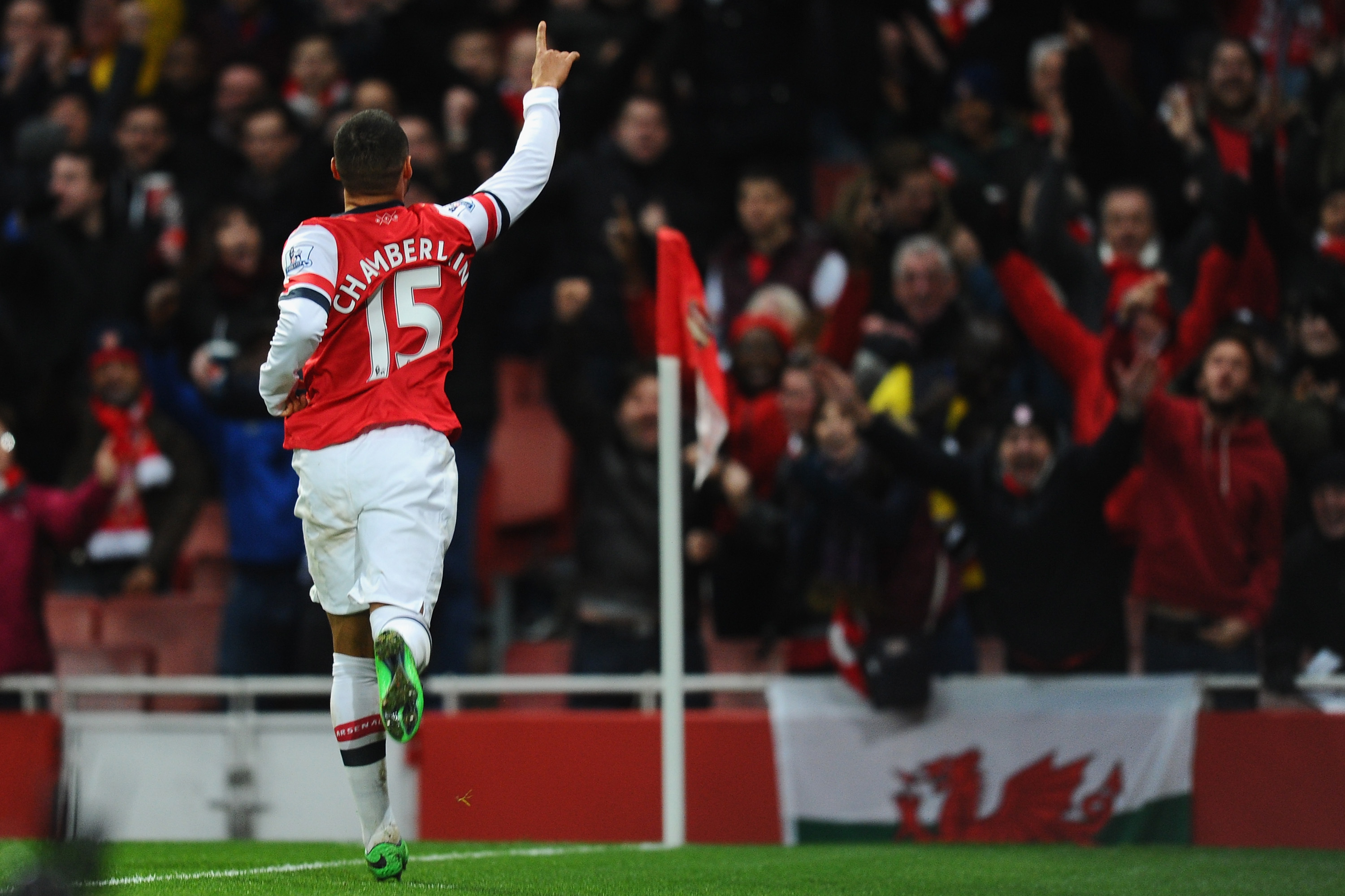 LONDON, ENGLAND - FEBRUARY 02:  Alex Oxlade-Chamberlain of Arsenal celebrates after scoring his first goal of Crystal Palace during the Barclays Premier League match between Arsenal and Crystal Palace at Emirates Stadium on February 2, 2014 in London, England.  (Photo by Mike Hewitt/Getty Images)