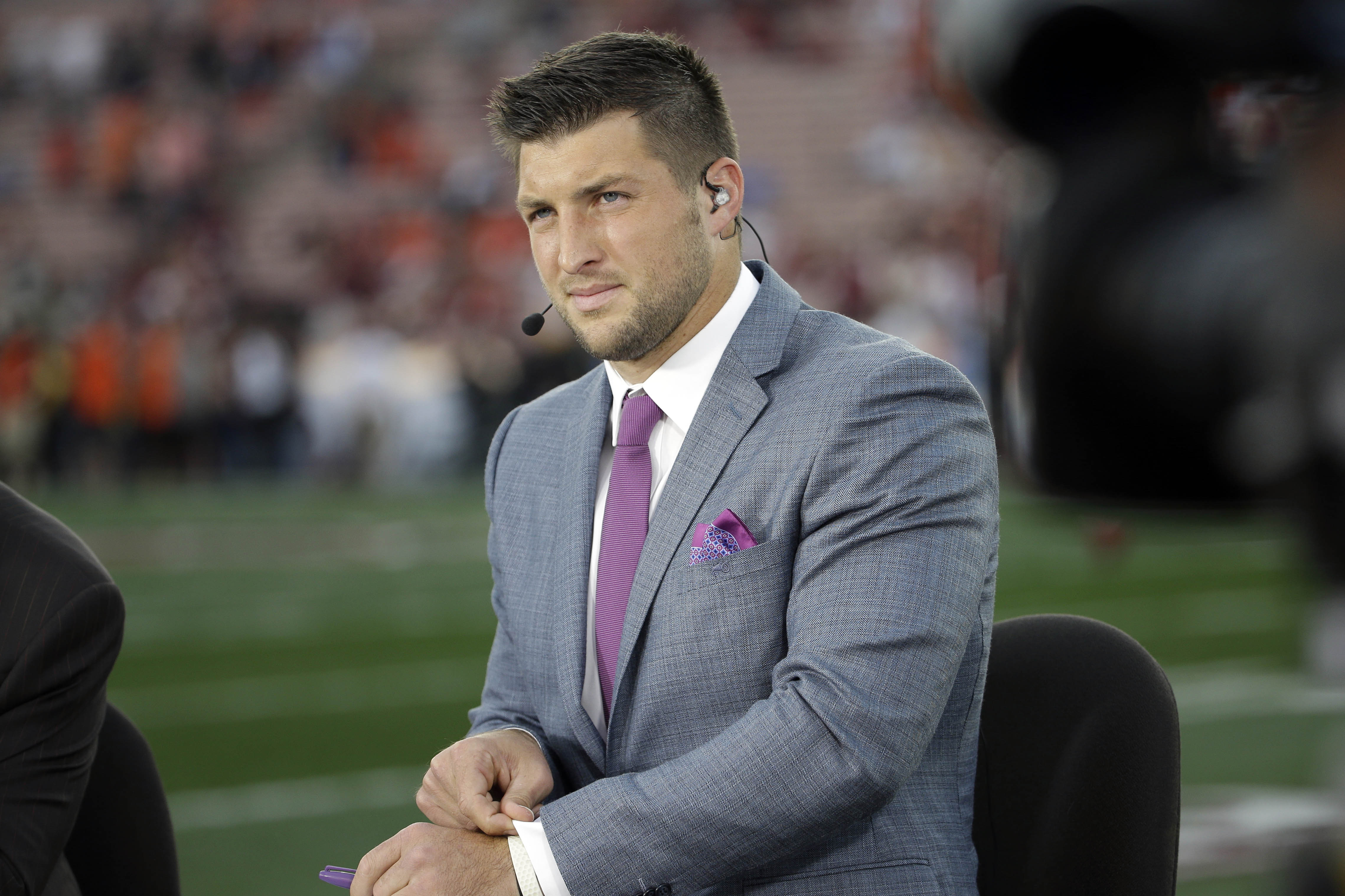 FILE - In this Jan. 6, 2014 file, photo shows Tim Tebow on ESPN before the NCAA BCS National Championship college football game between Auburn and Florida State in Pasadena, Calif. Tebow will be a special guest on ABC's